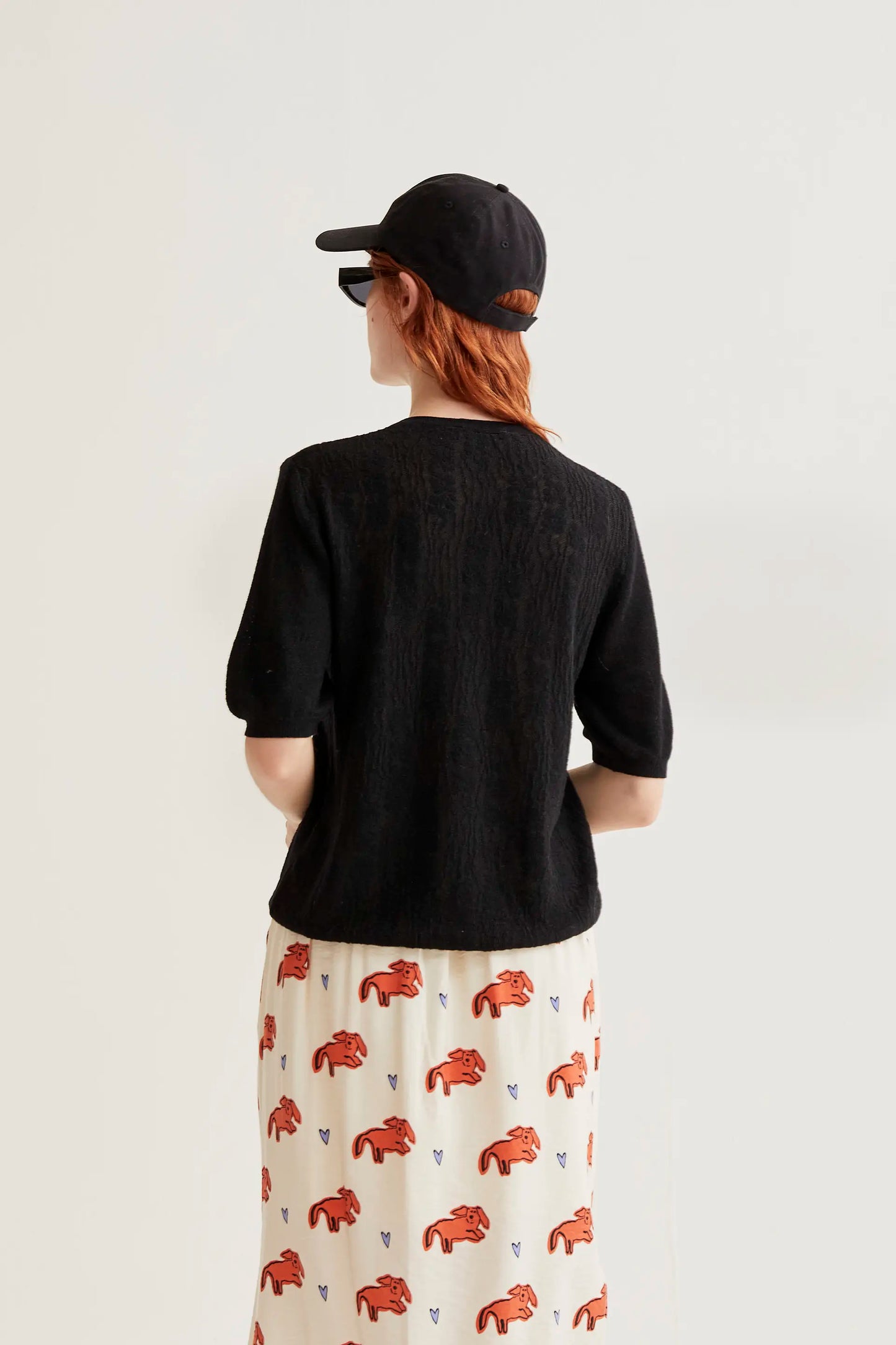 Black floral knit cardigan with ruffles