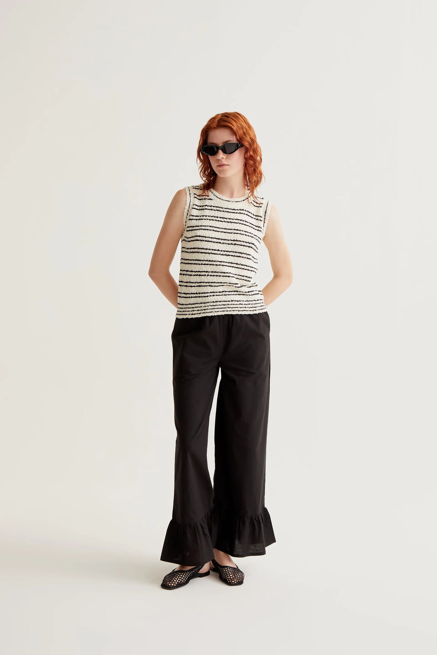 Top in maglia testurizzata con strisce nere