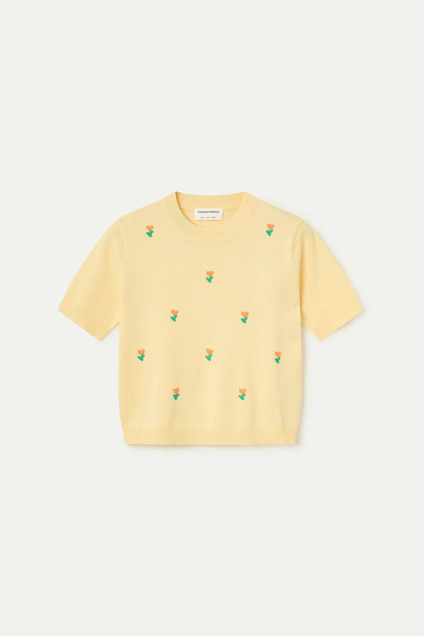 Top in maglia gialla morbida con fiori