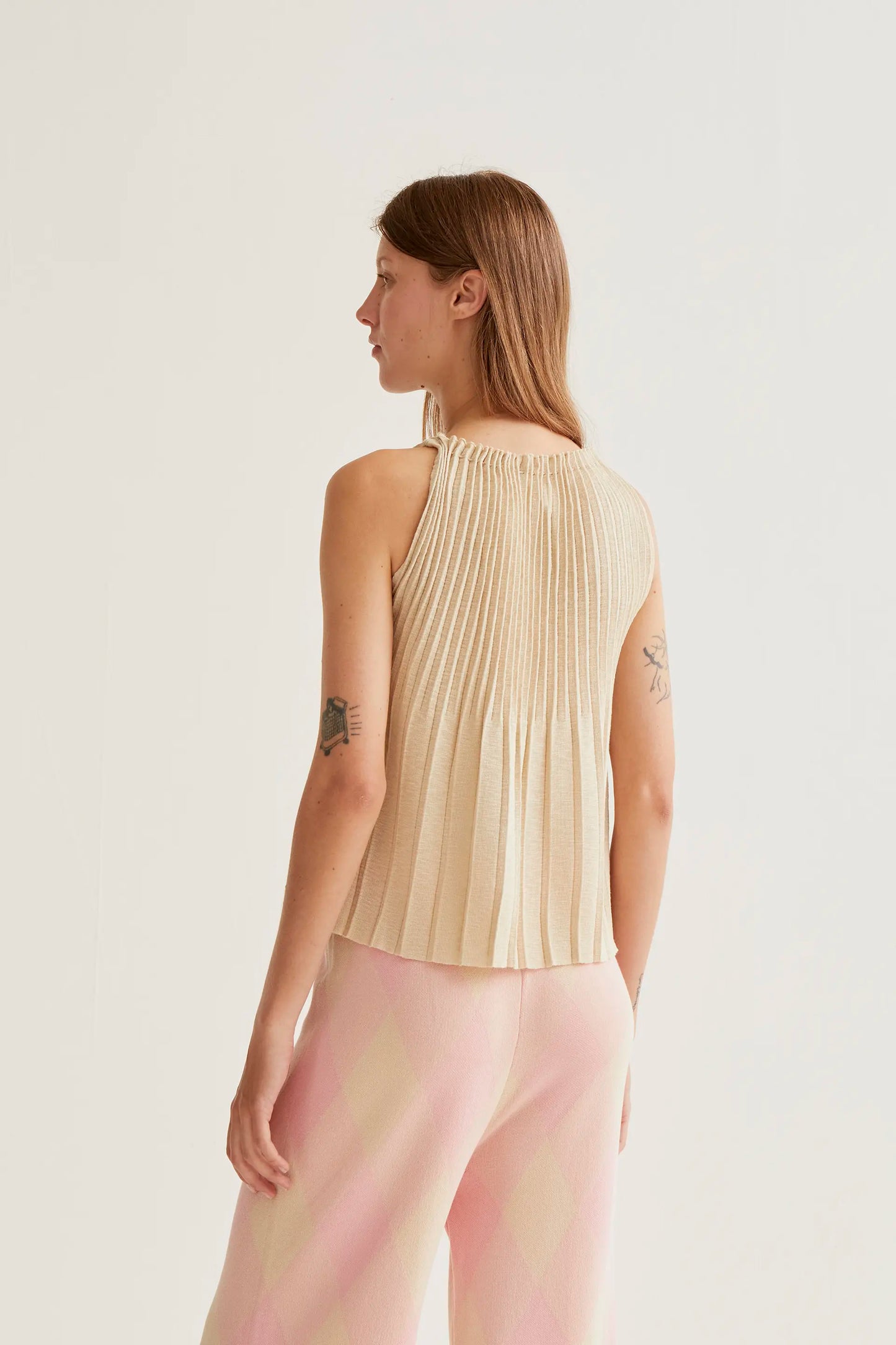 Top plissettato beige