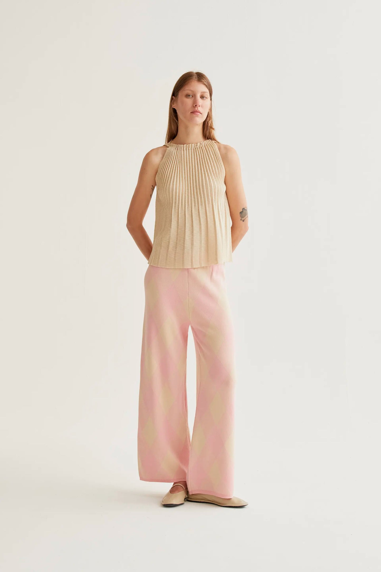 Top plissettato beige