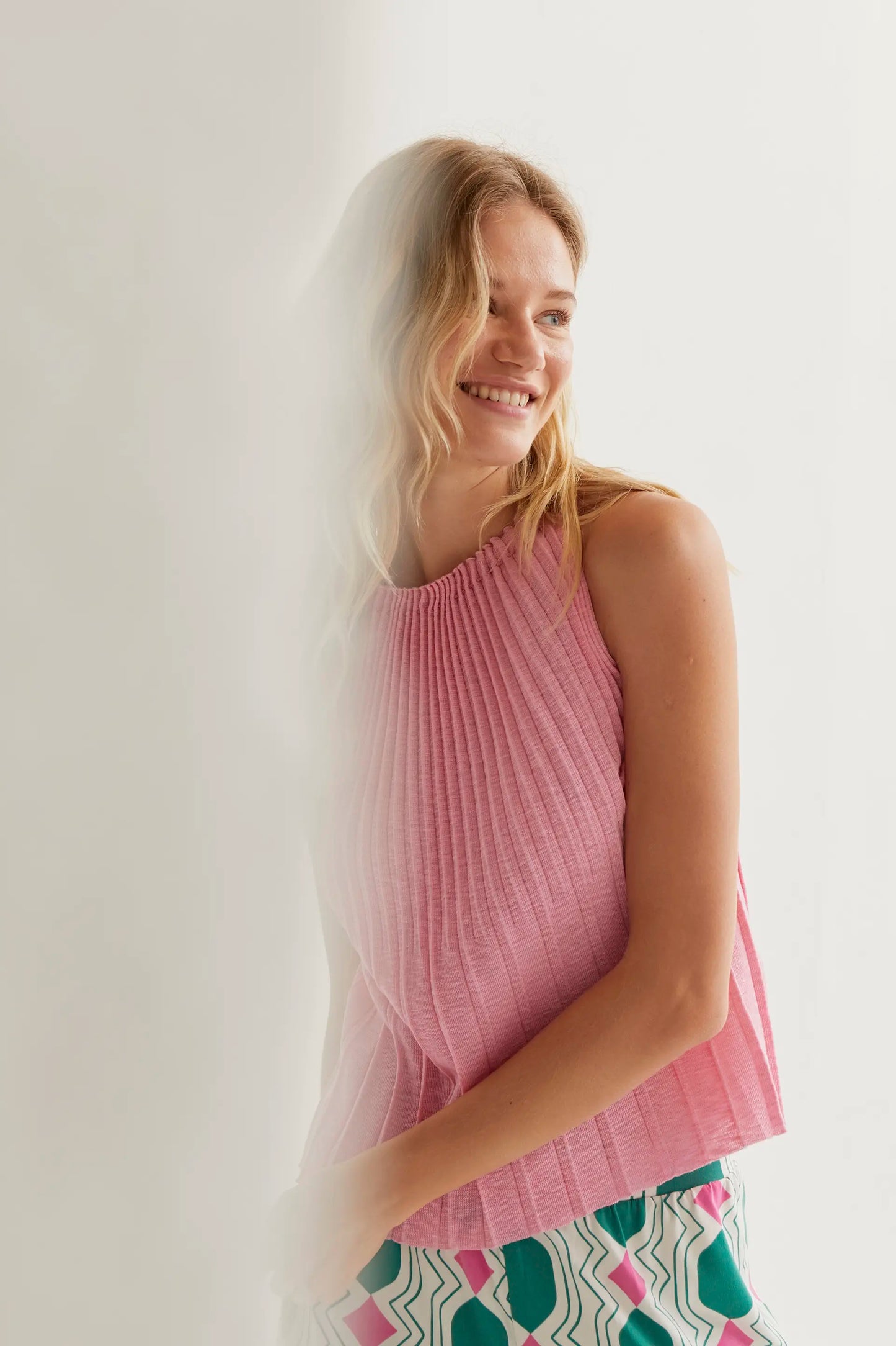 Top plissettato rosa