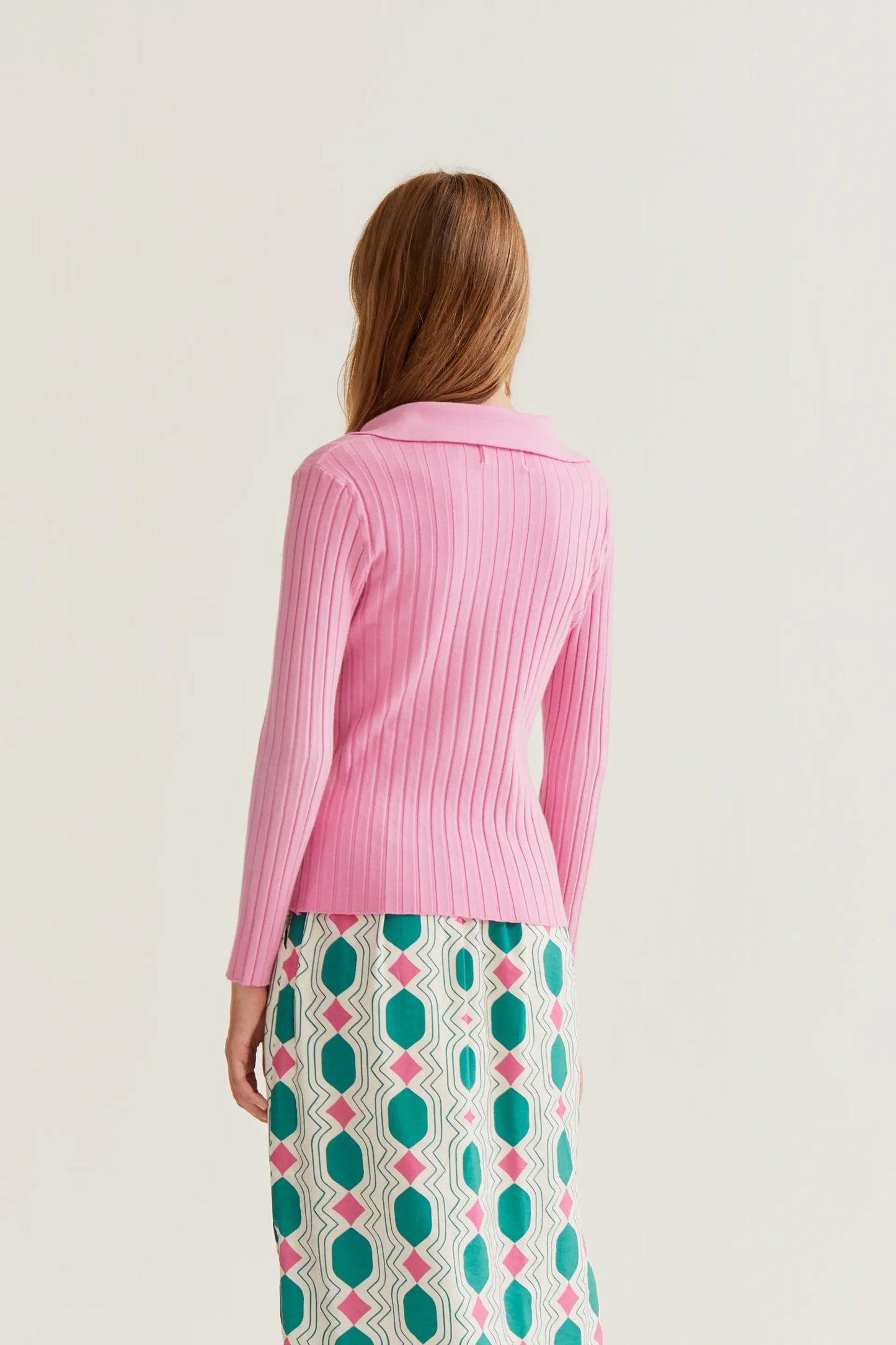 Maglione rosa lavorato a maglia