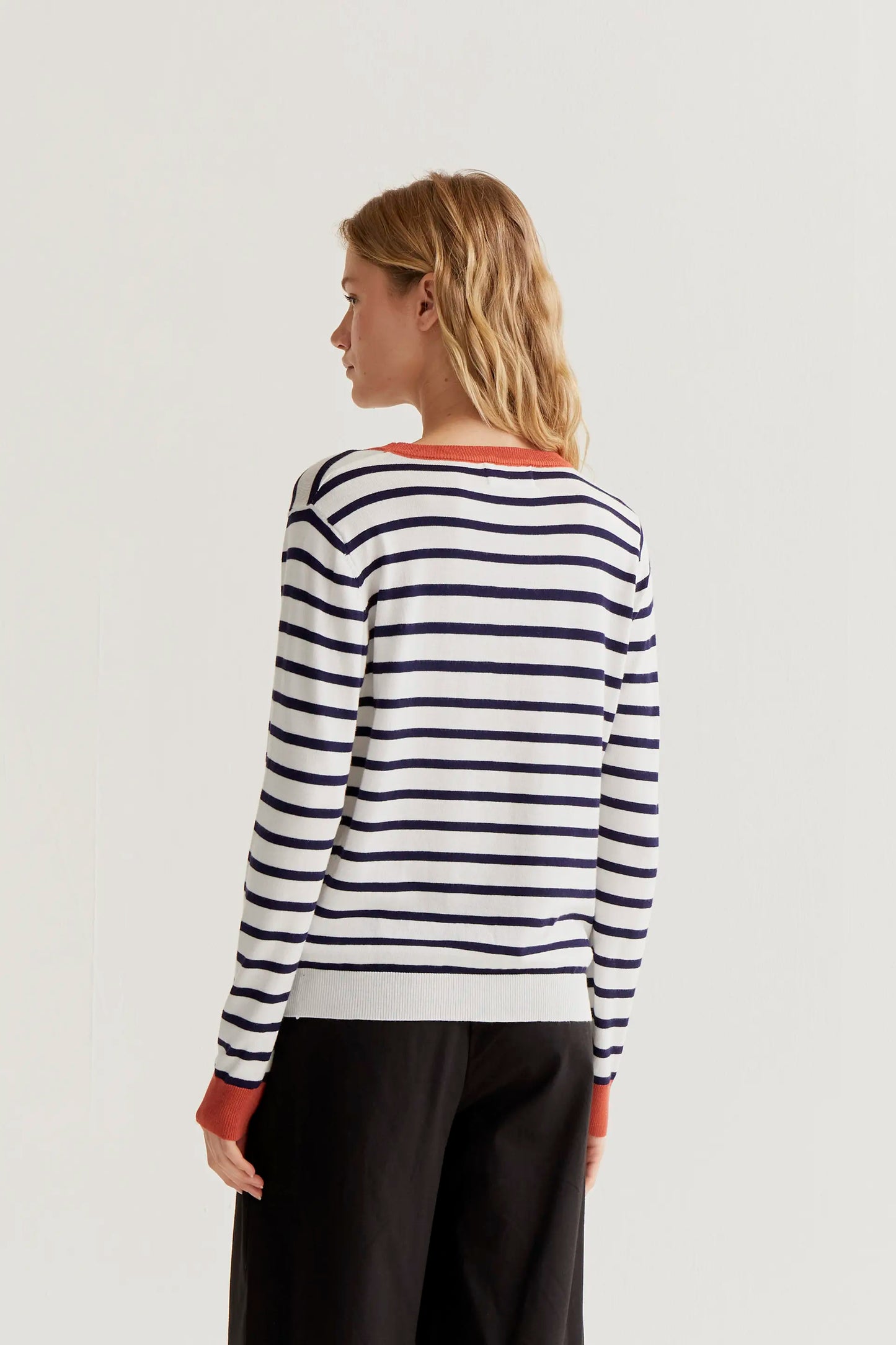Knitted sweater with white and navy striped print