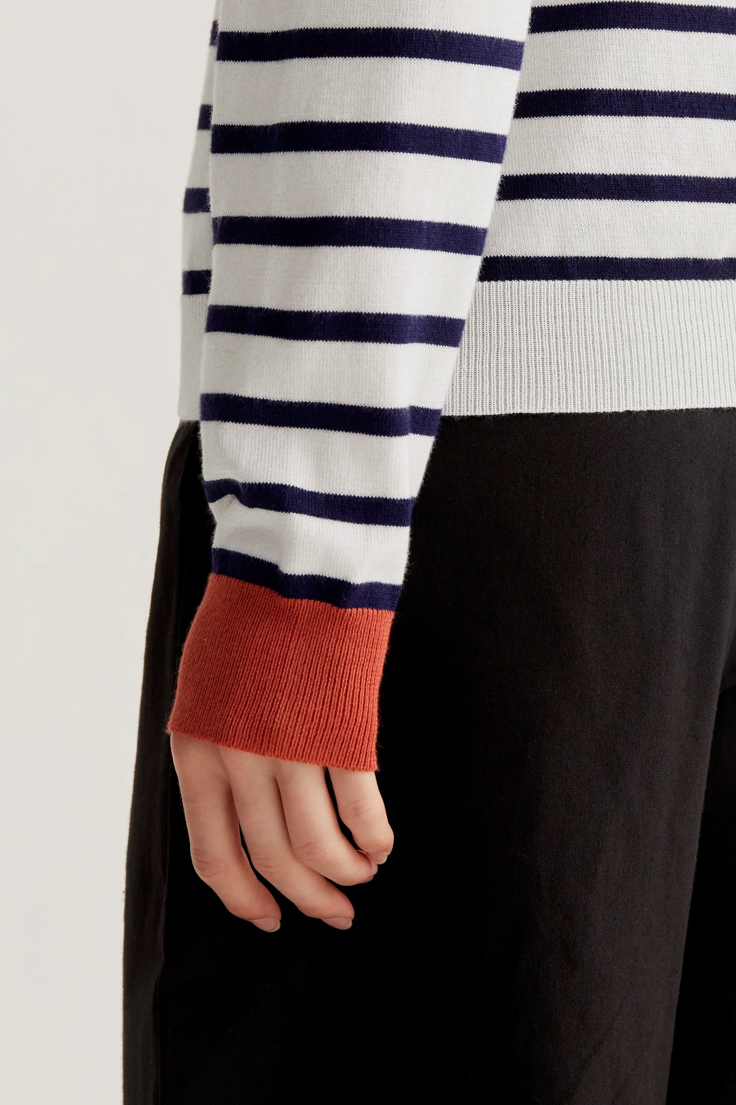 Knitted sweater with white and navy striped print
