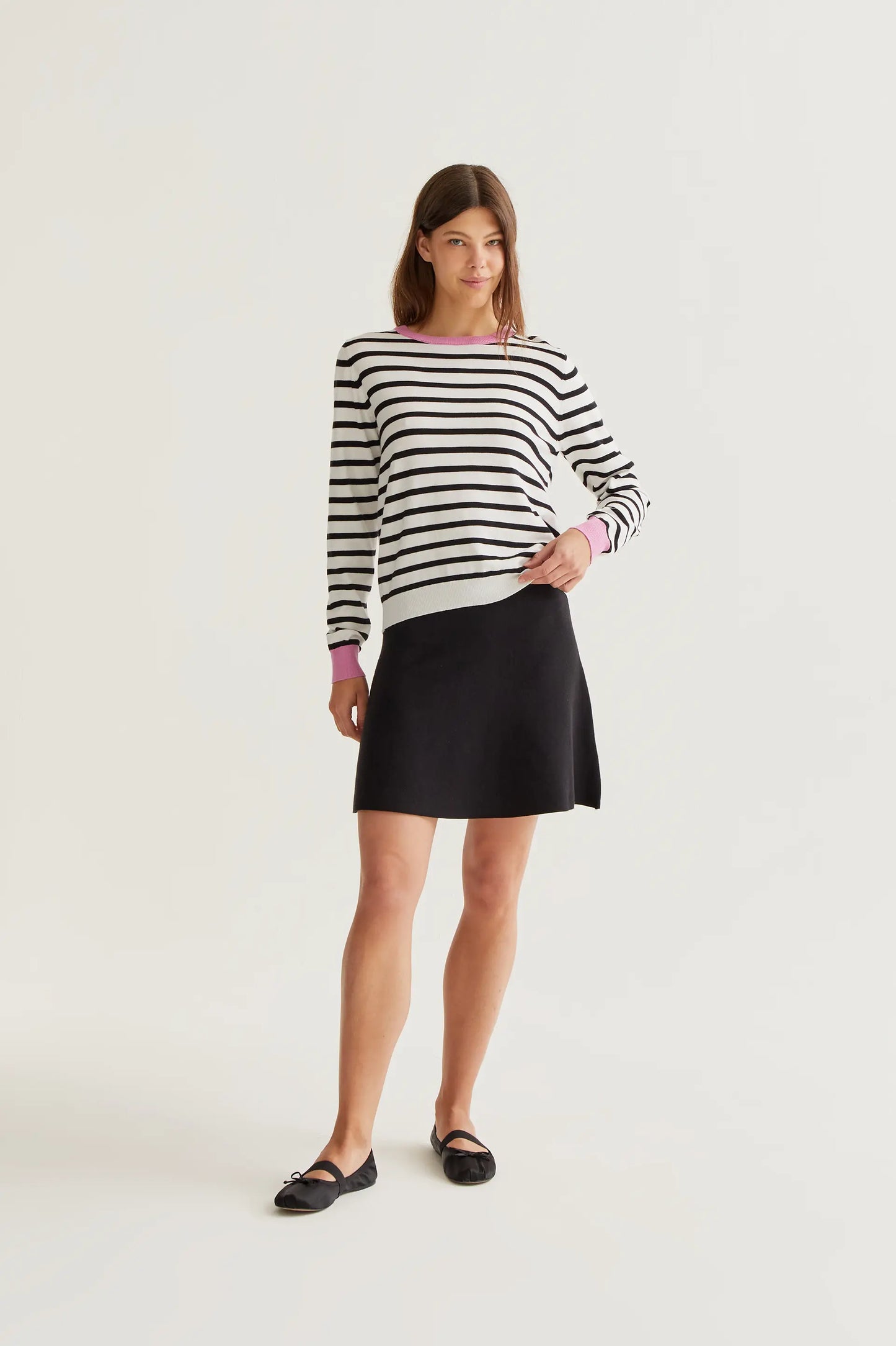 Knitted sweater with black and white striped print