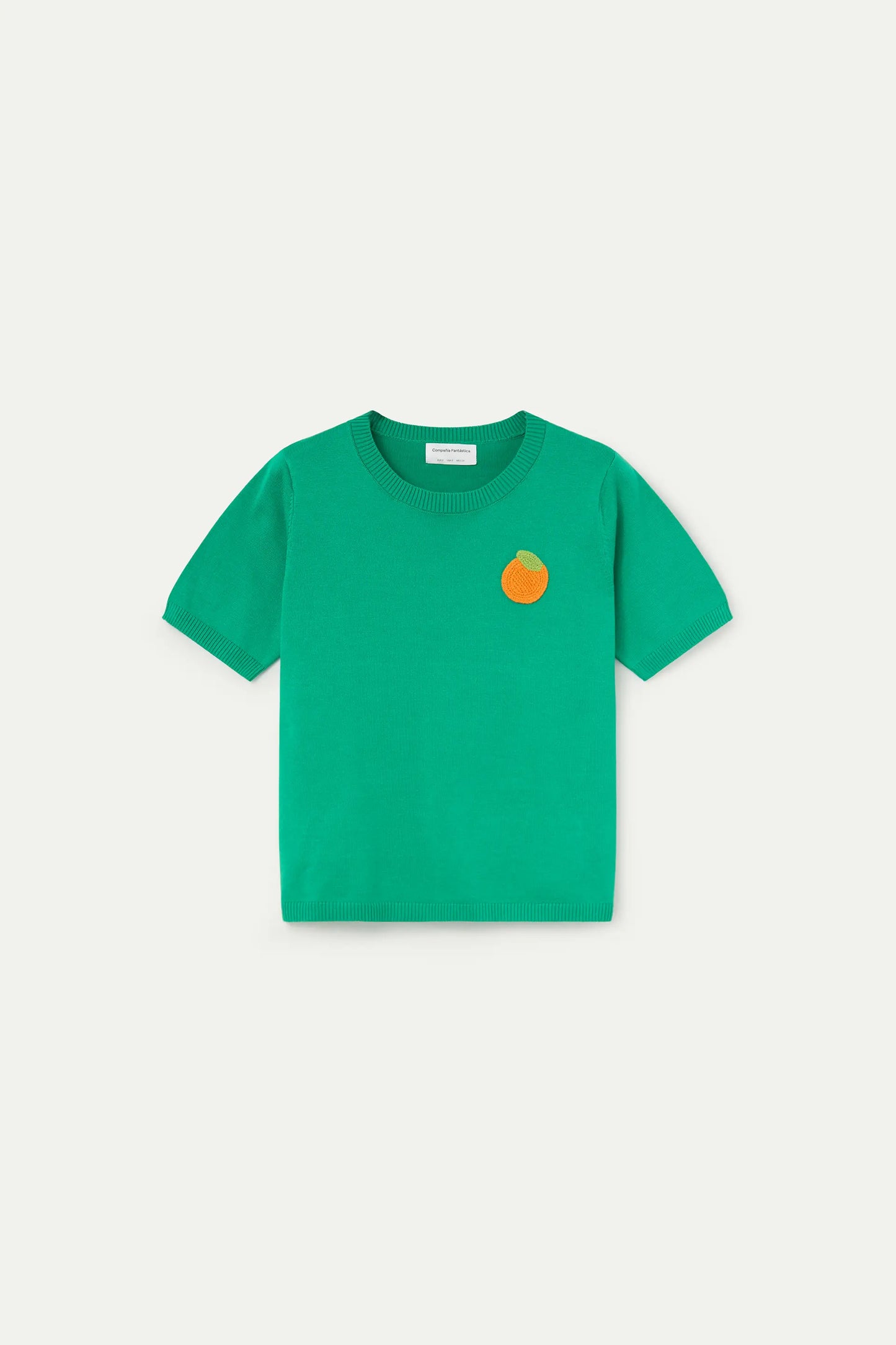 Top in maglia verde con ricamo arancione