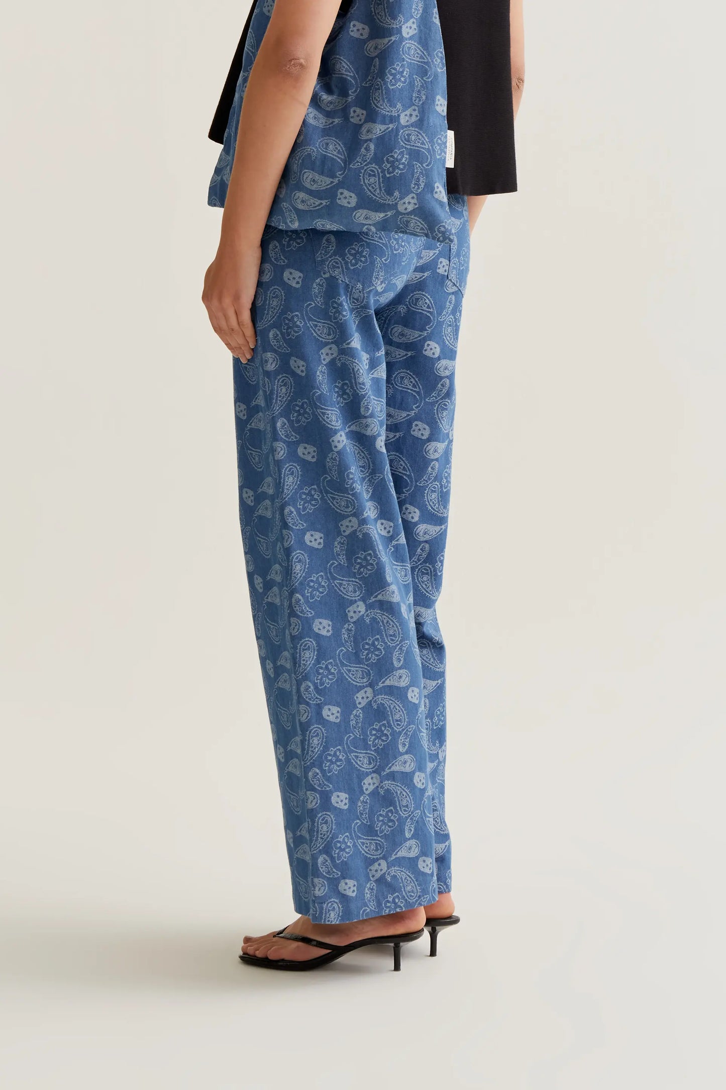 Blue jeans with paisley print