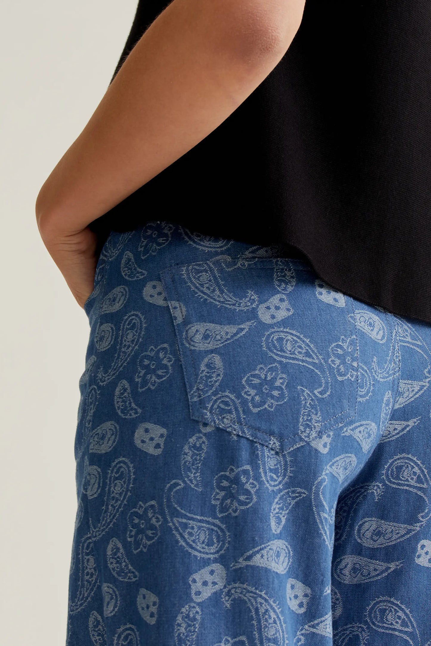 Blue jeans with paisley print