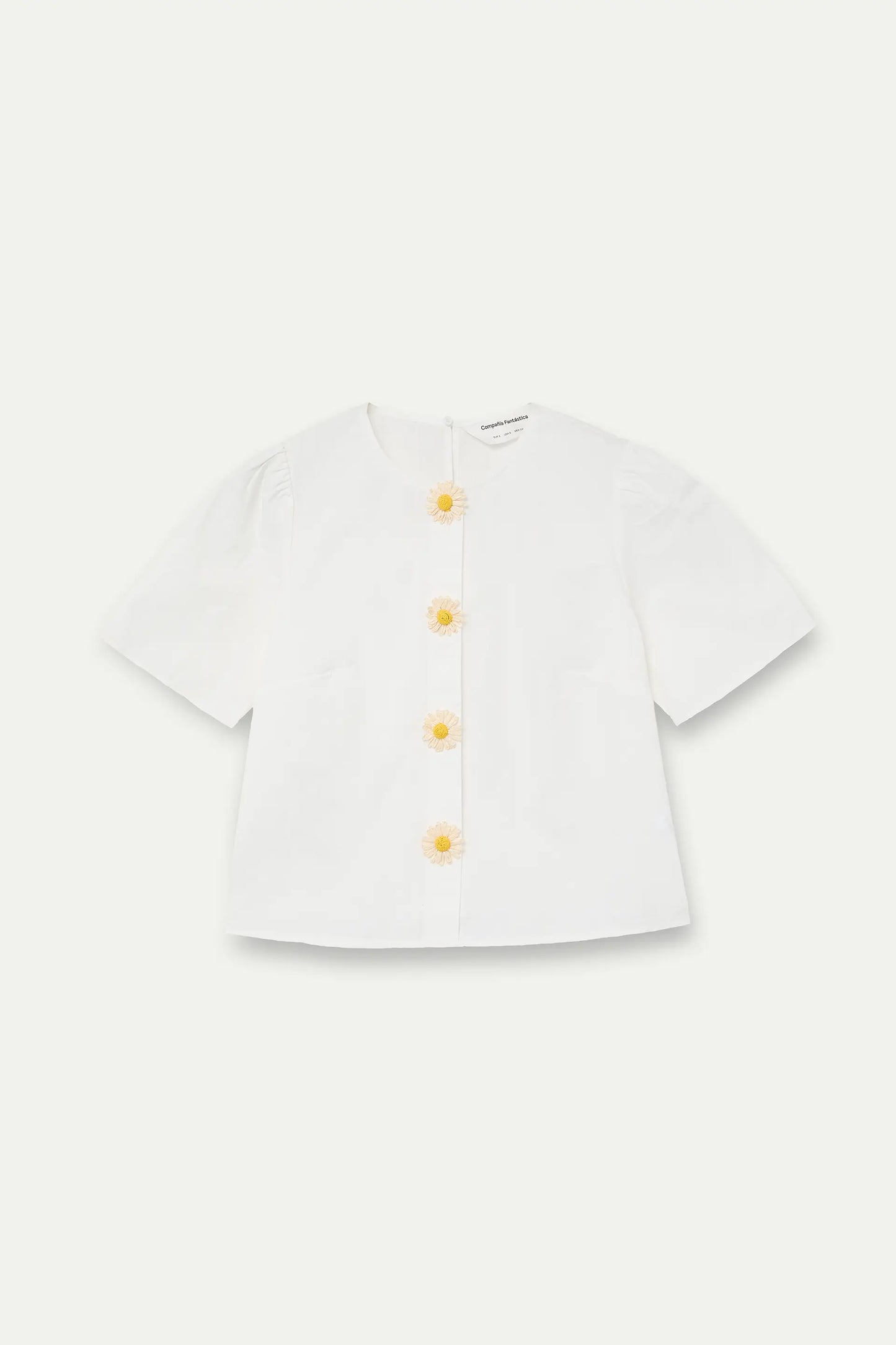 Top in 100% cotone con bottoni floreali