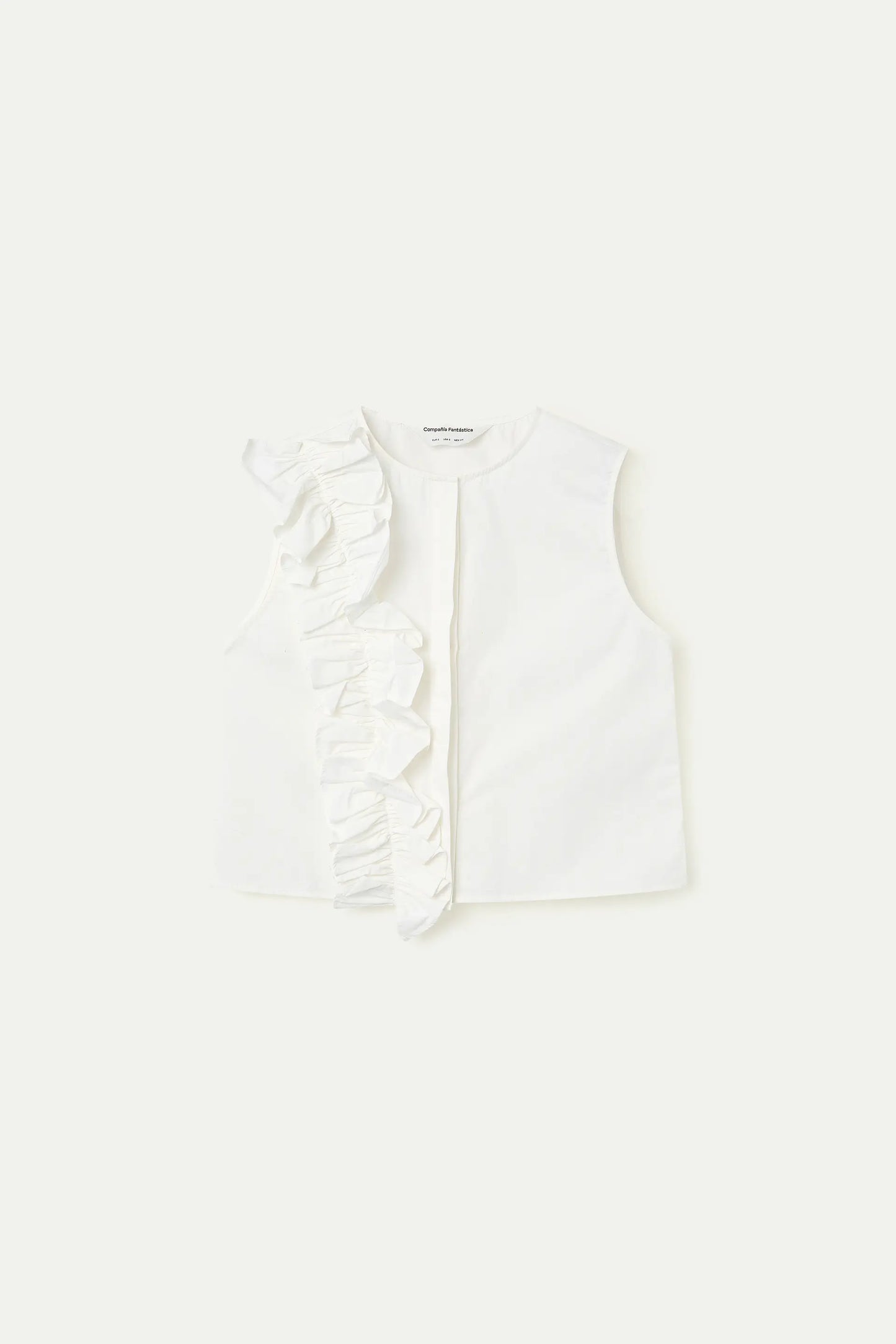 Top bianco in 100% cotone con volant