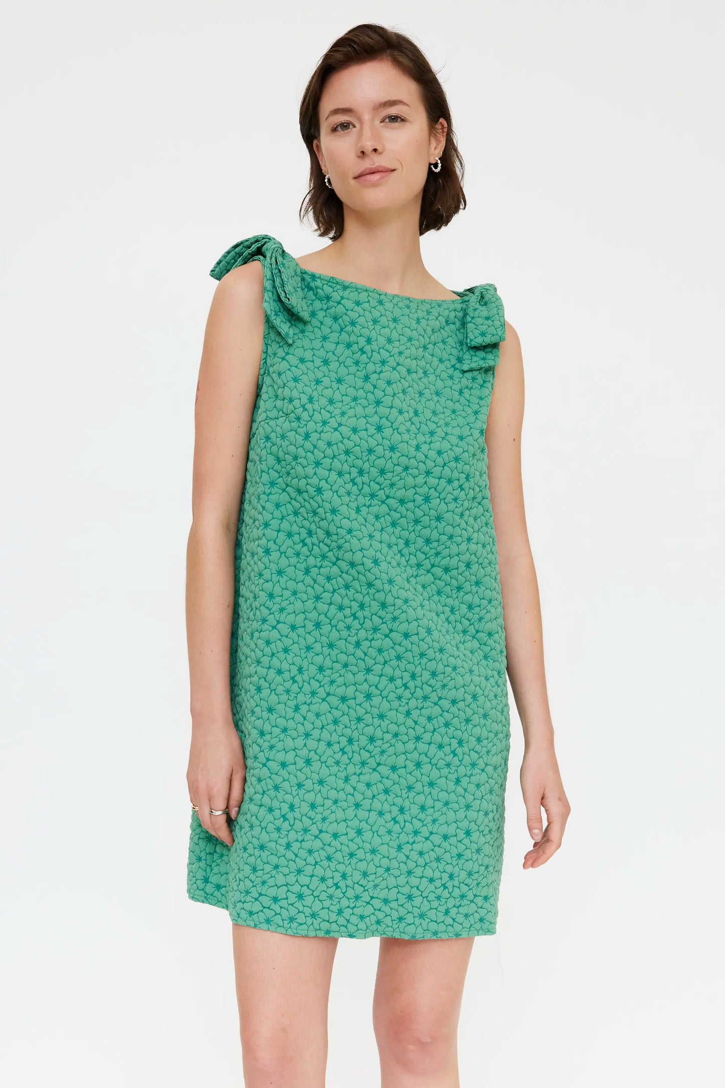 Short green dress with floral texture