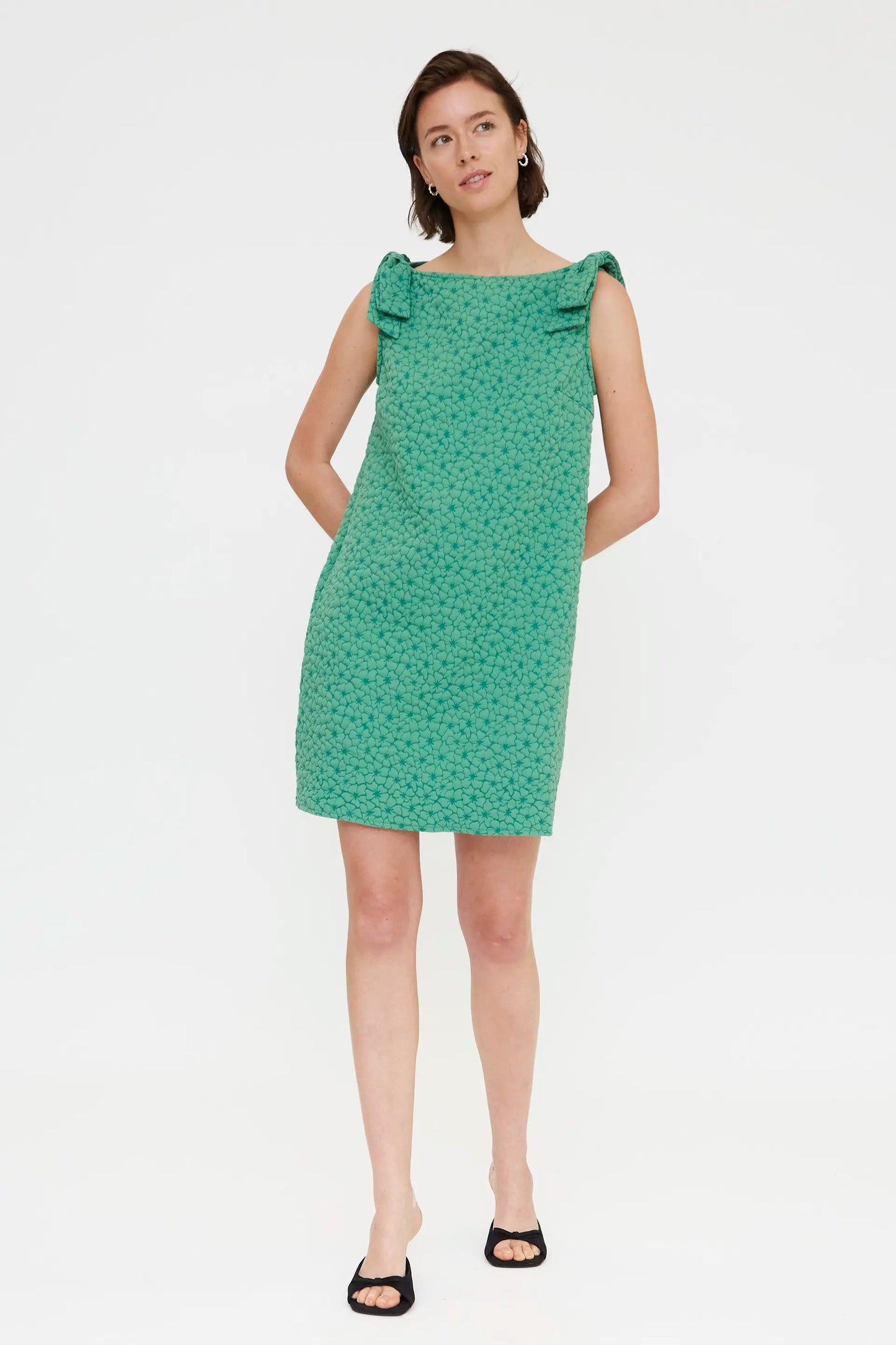 Short green dress with floral texture