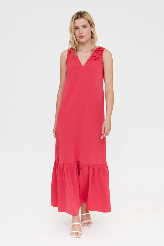 Vestido largo fucsia con escote pico