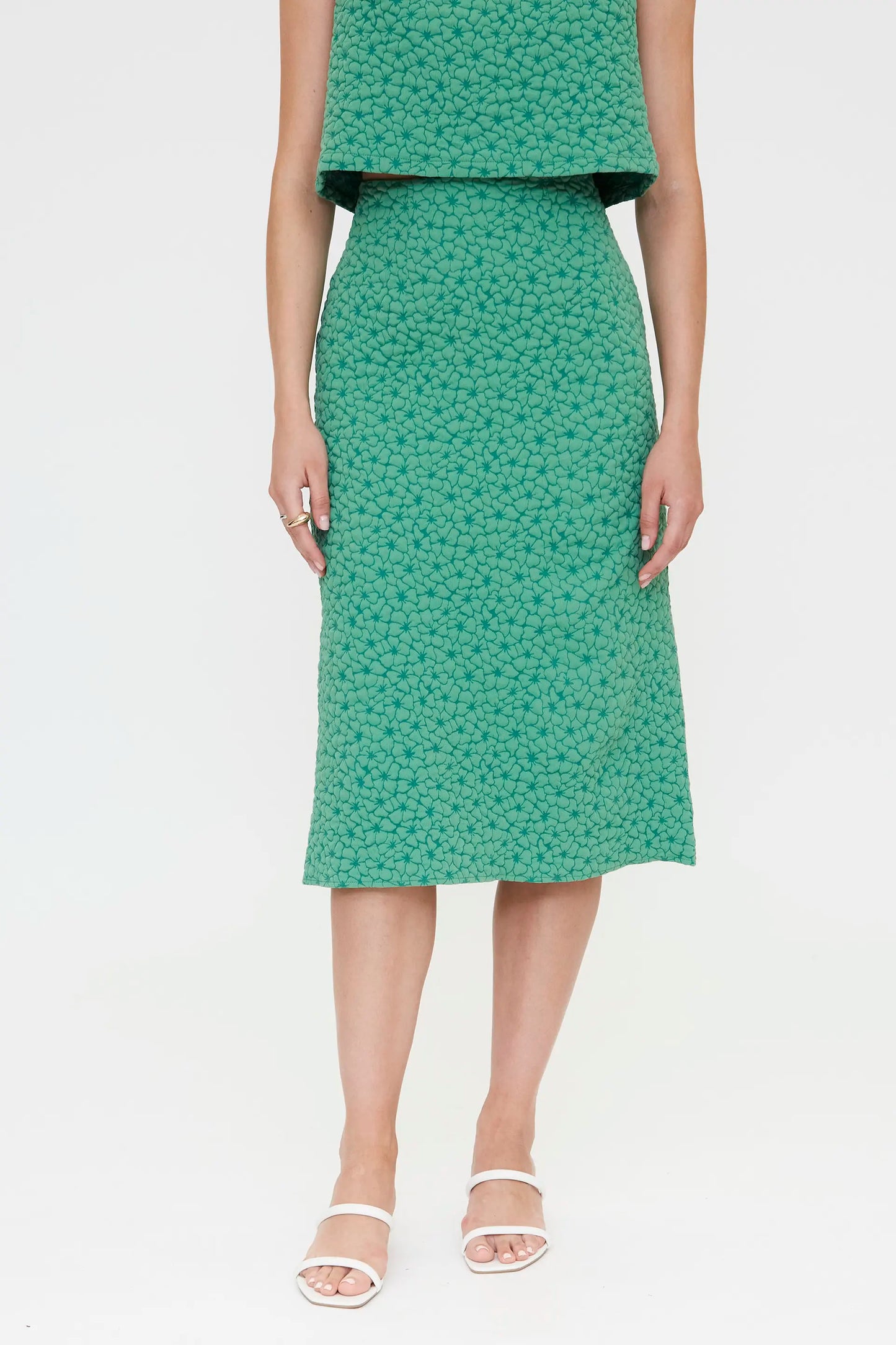 Falda midi verde con textura floral