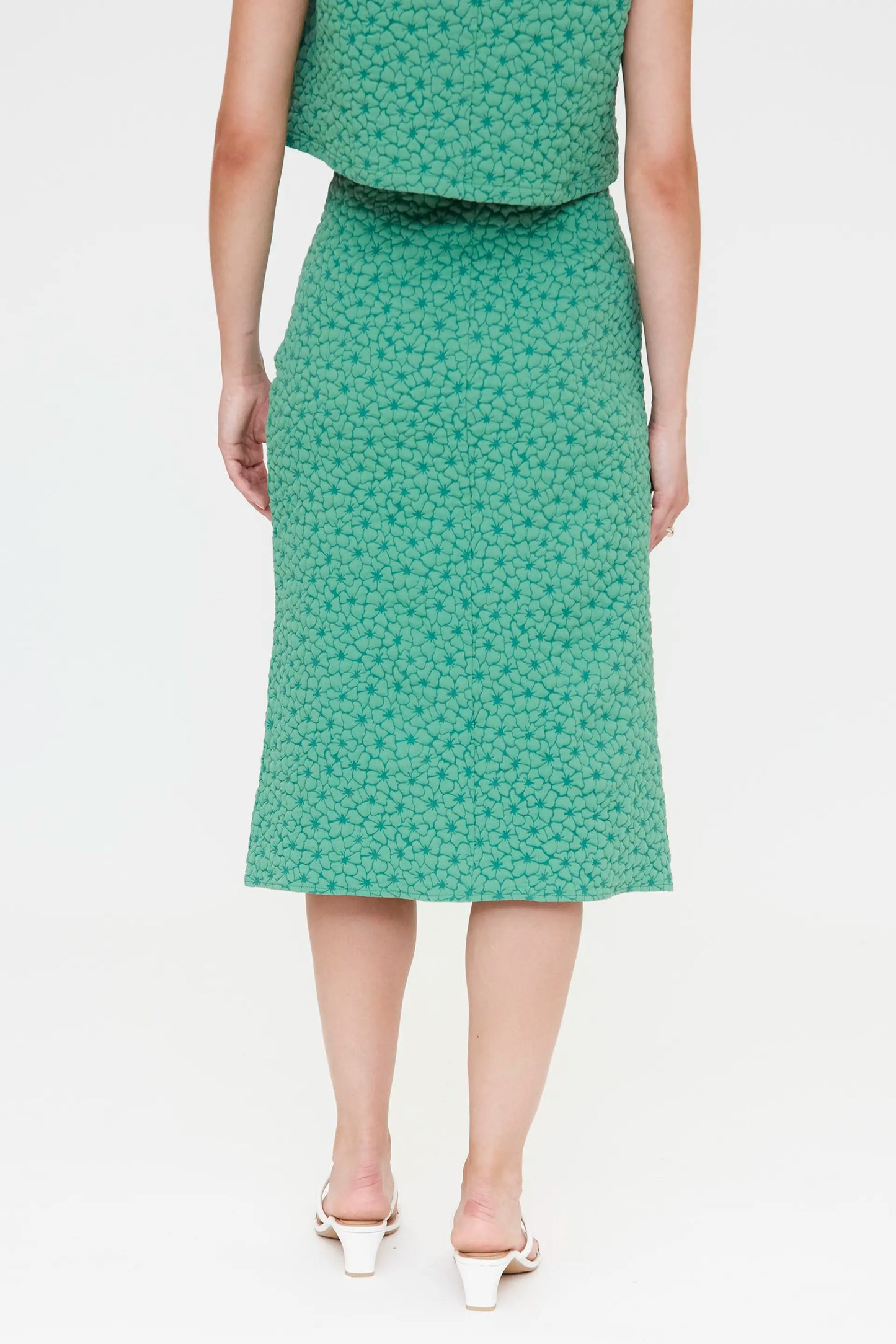 Falda midi verde con textura floral