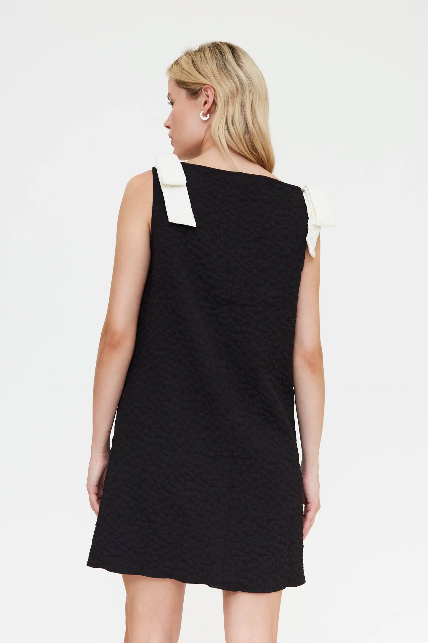 Short black dress with floral texture