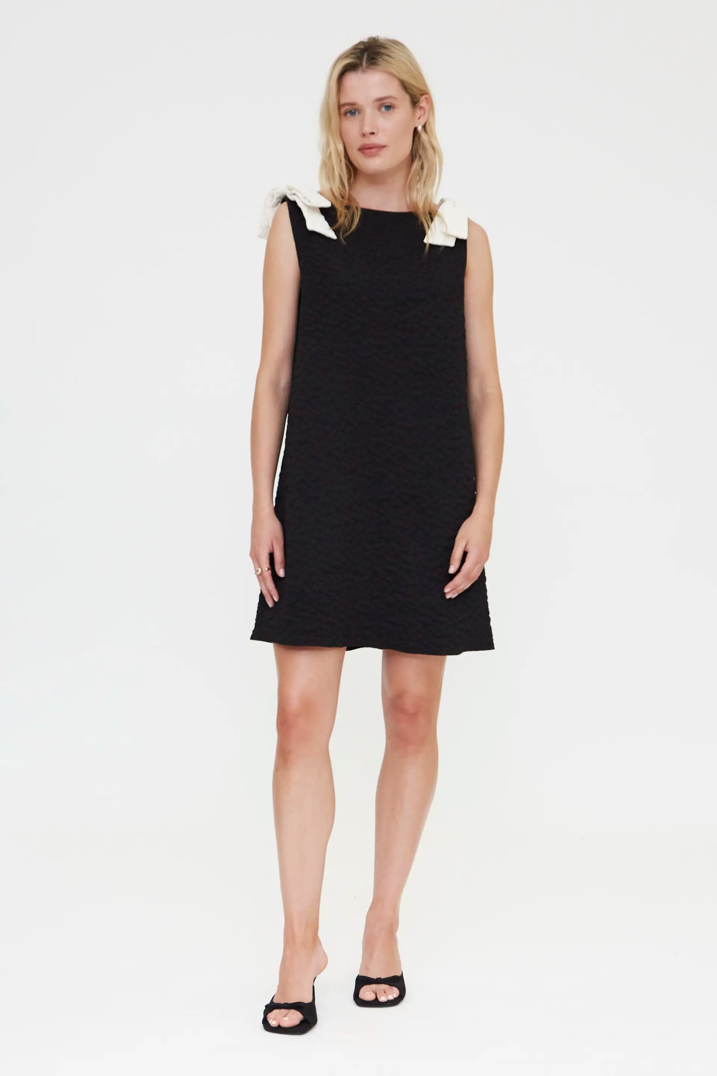 Short black dress with floral texture