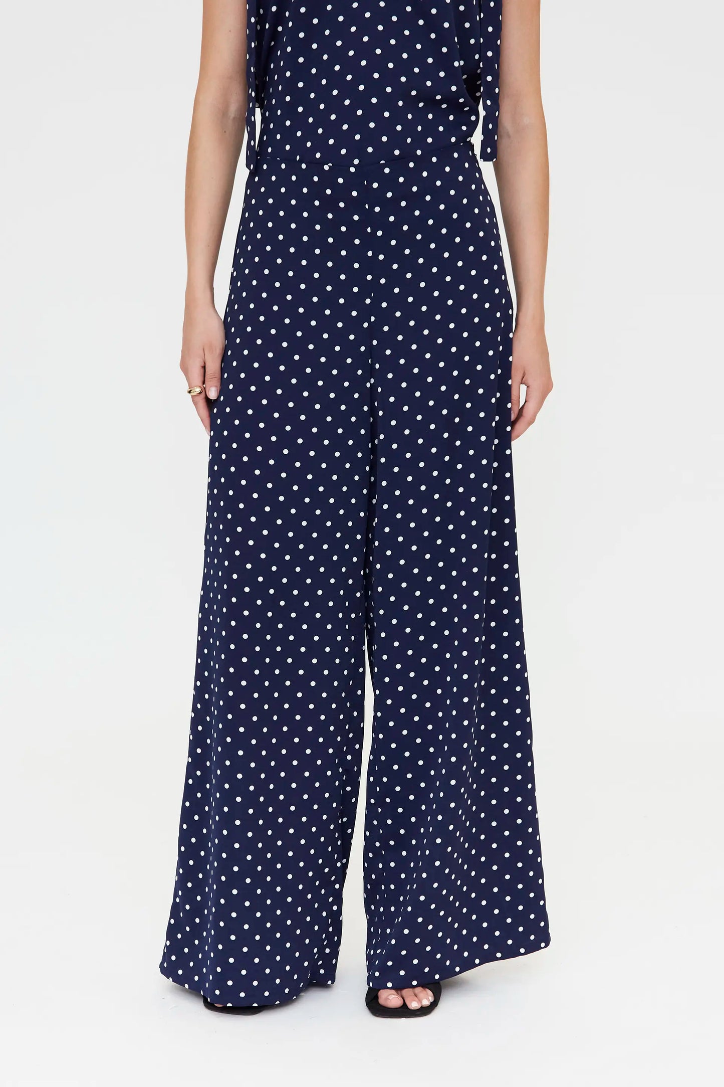 Trousers with navy blue mini dot print