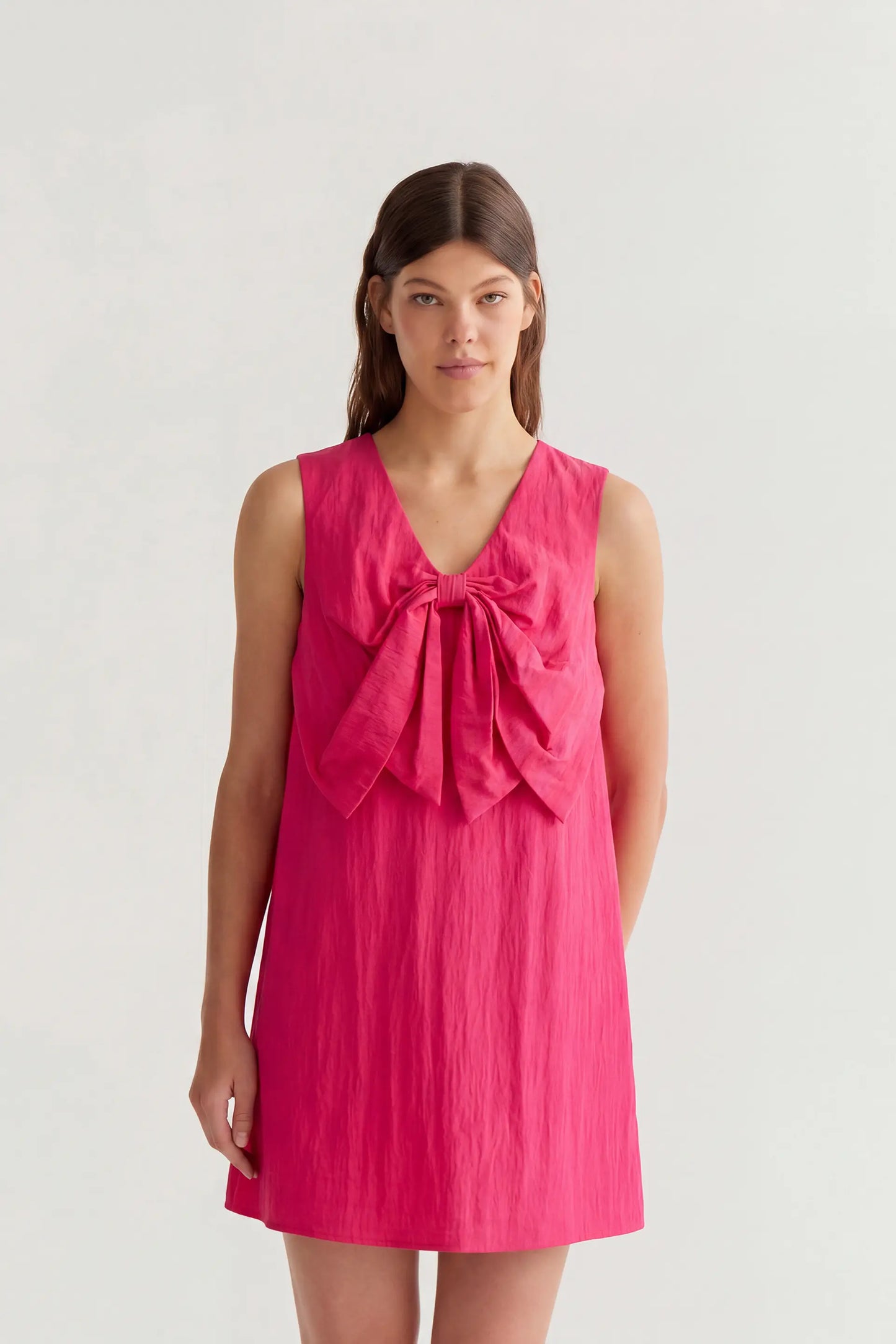 Fuchsia short dress with a large bow