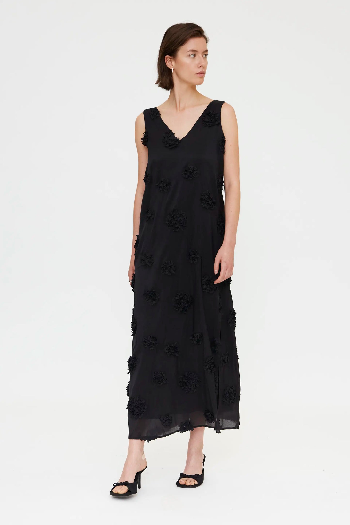 Long black dress with floral detail