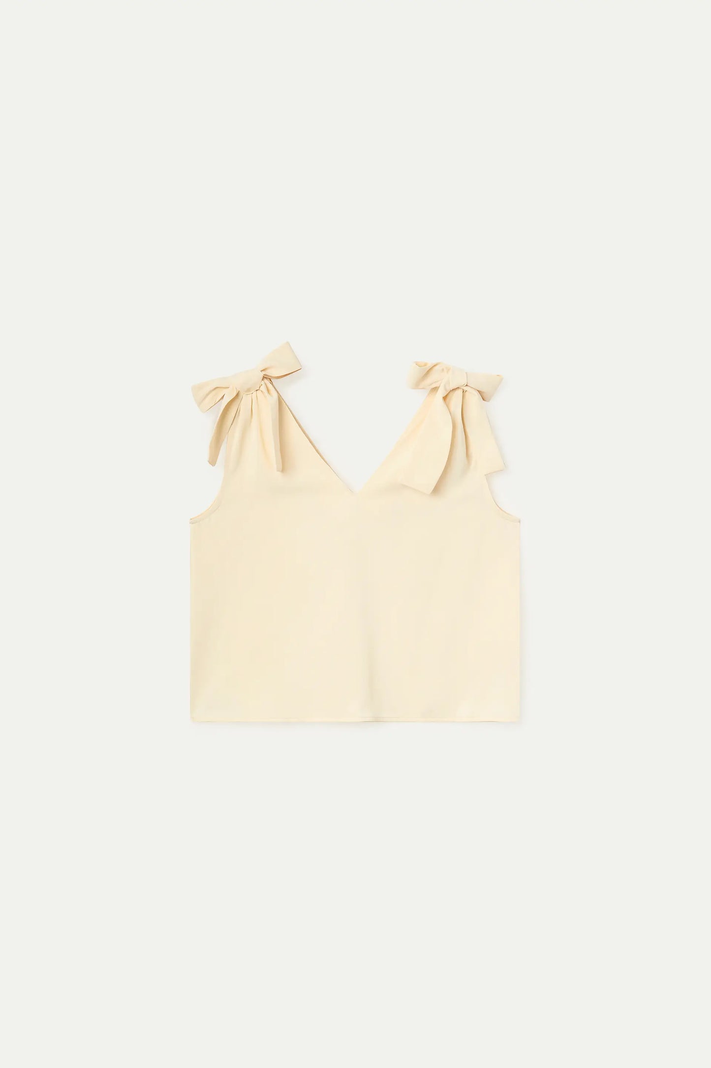 Top bianco sporco con spalline annodate