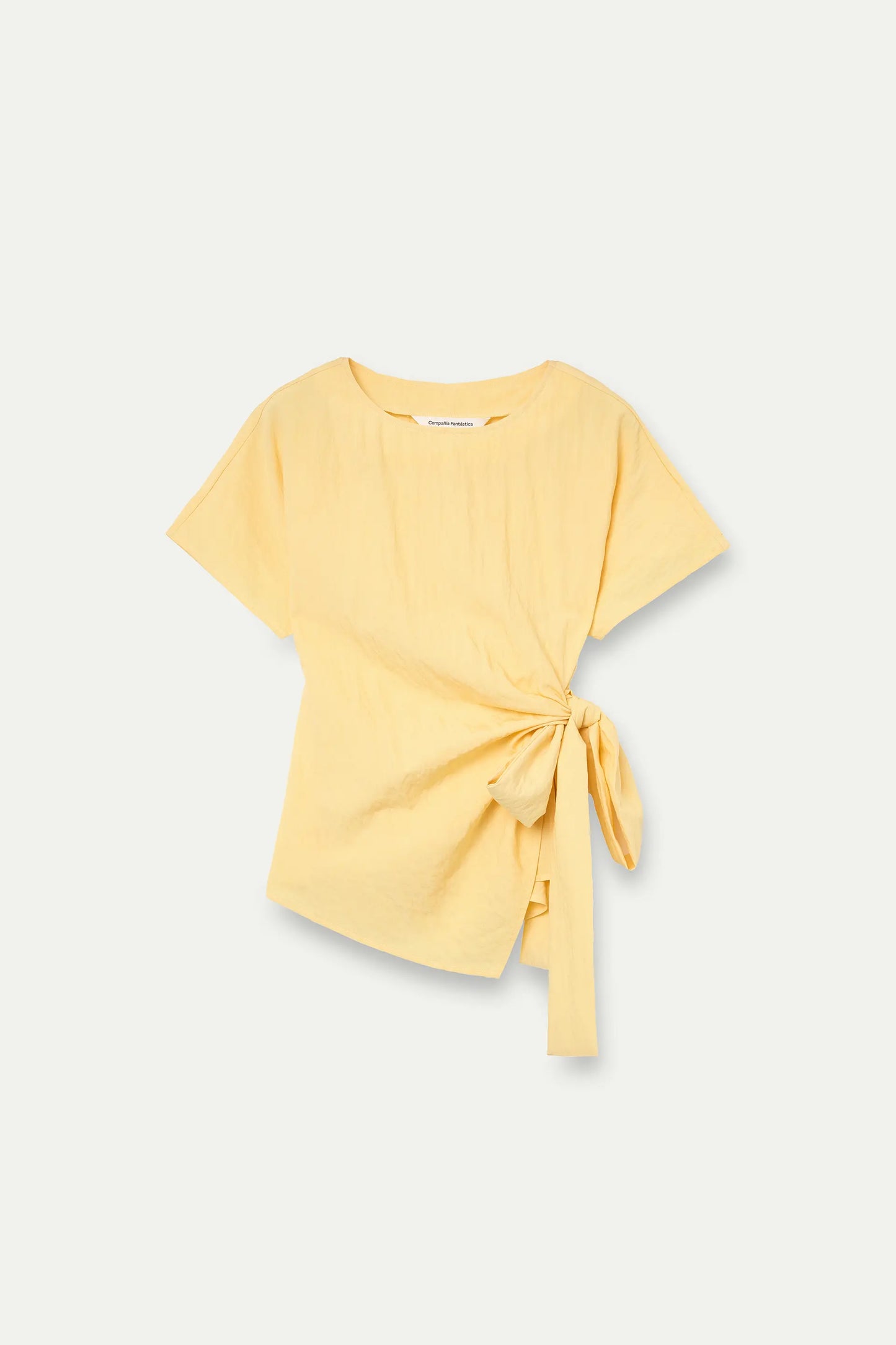 Light yellow top with tie detail