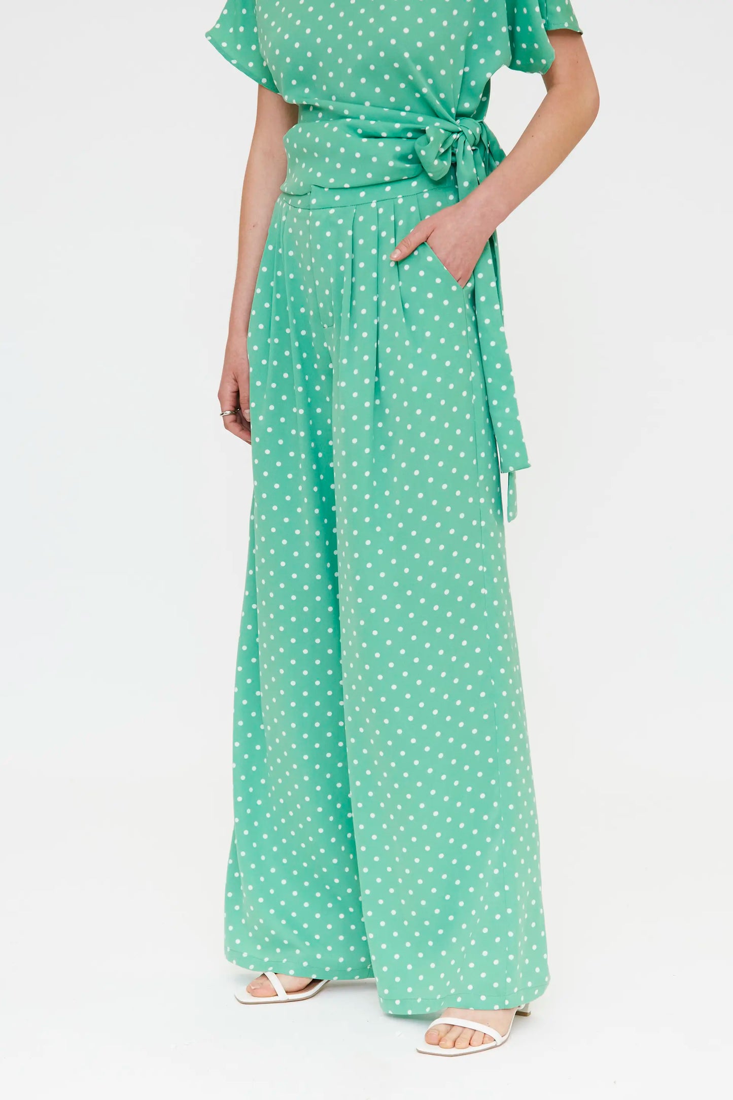 Pantaloni con stampa a mini pois verdi