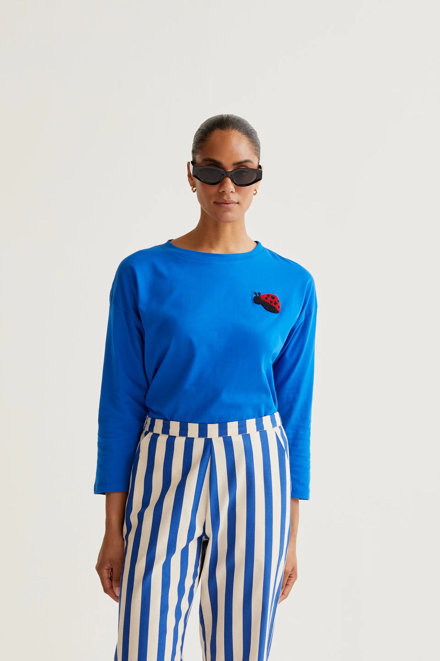 Blue t-shirt with Coccinellidae embroidery