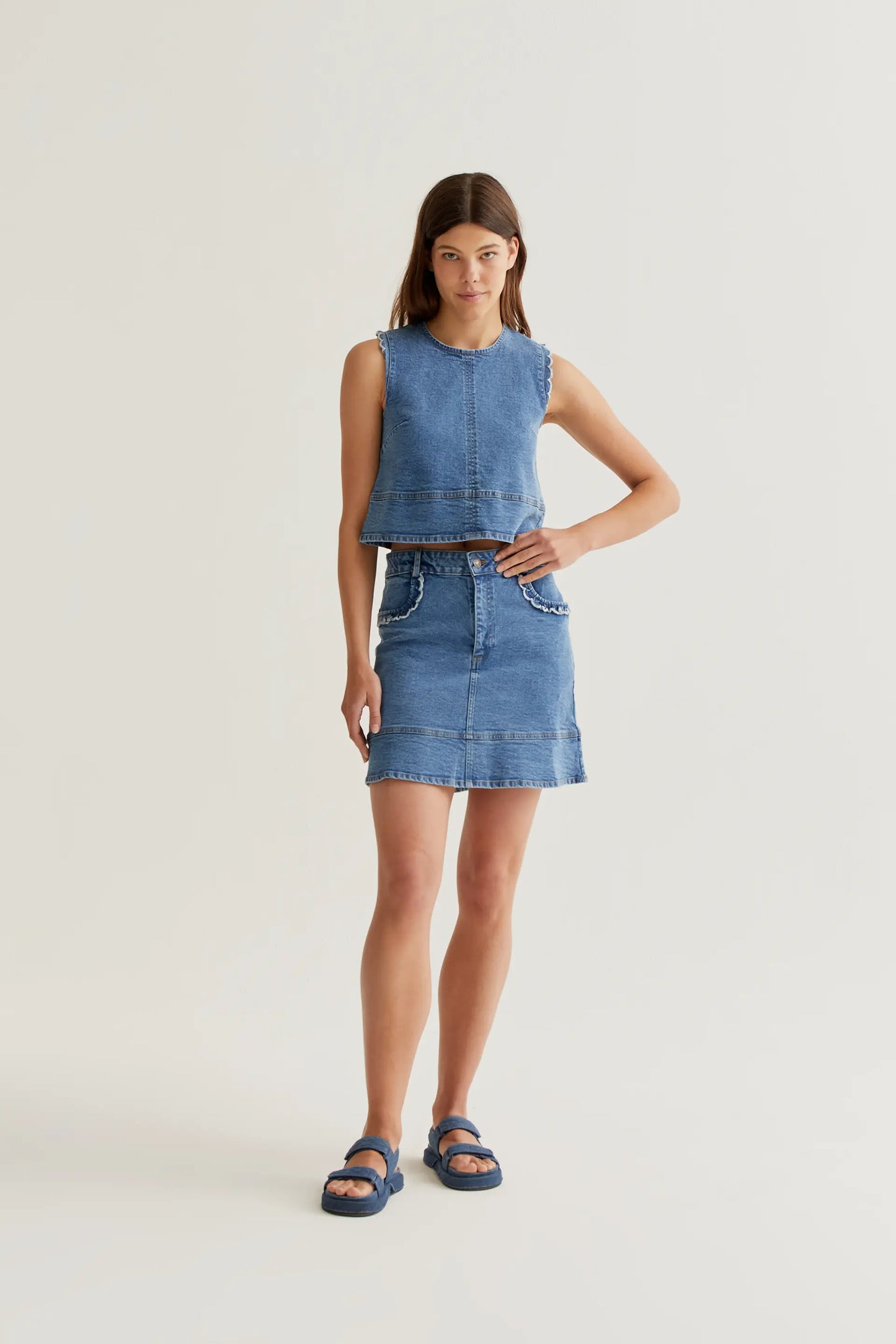 Blue denim skirt with ruffle detail