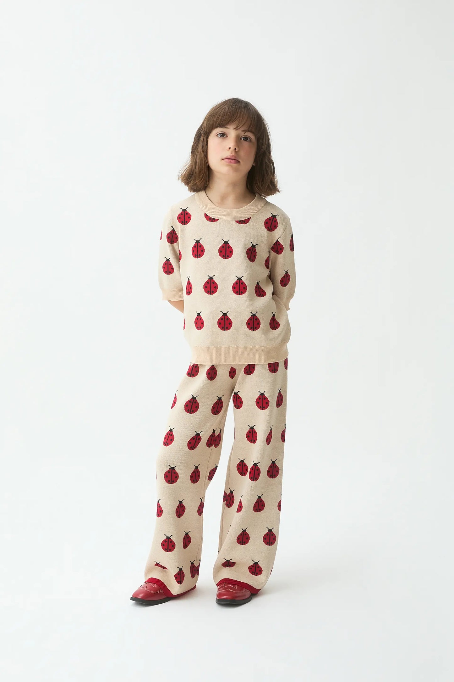 Girls' jacquard knit trousers with Red Coccinella print