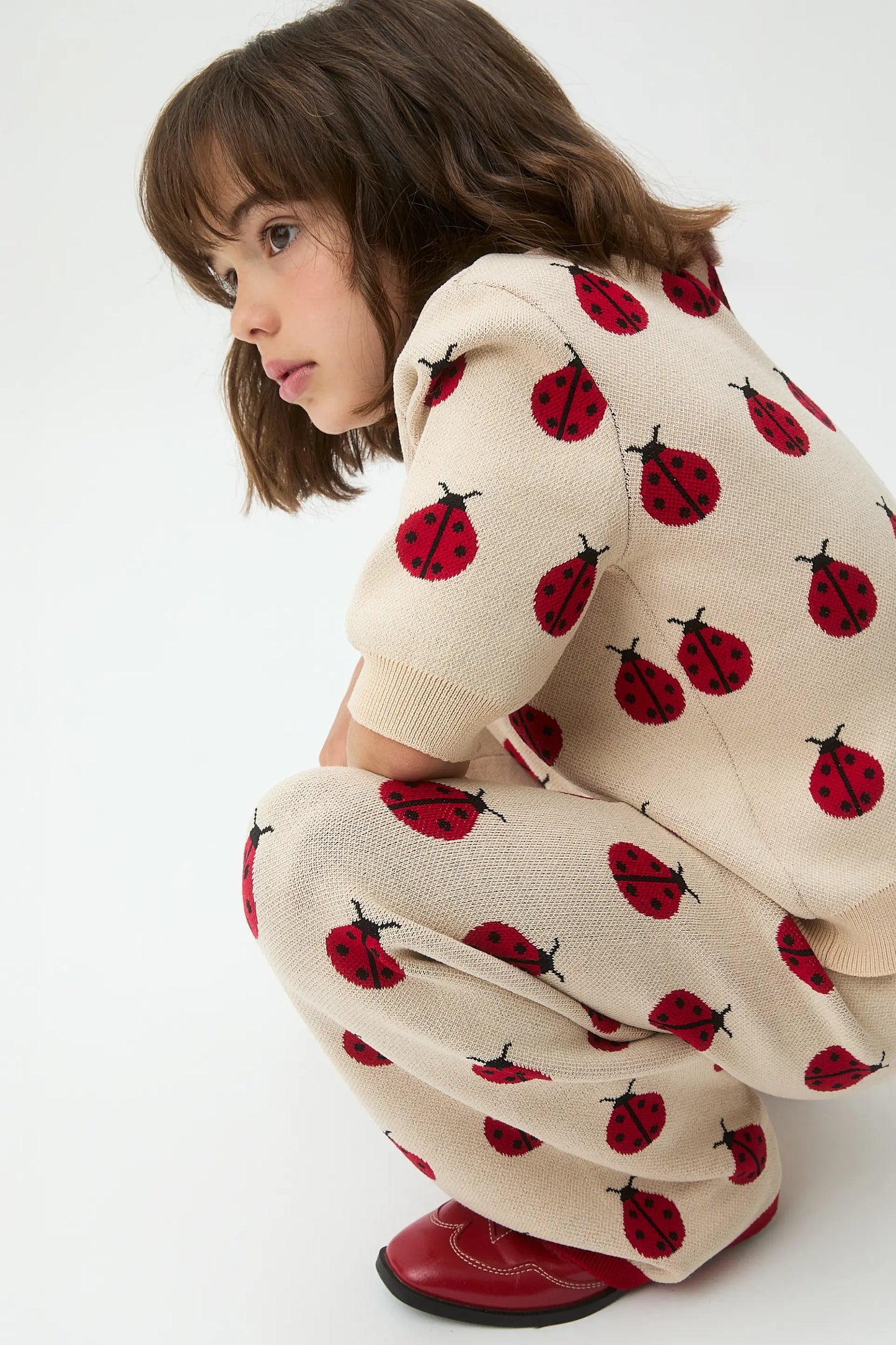 Girls' jacquard knit trousers with Red Coccinella print