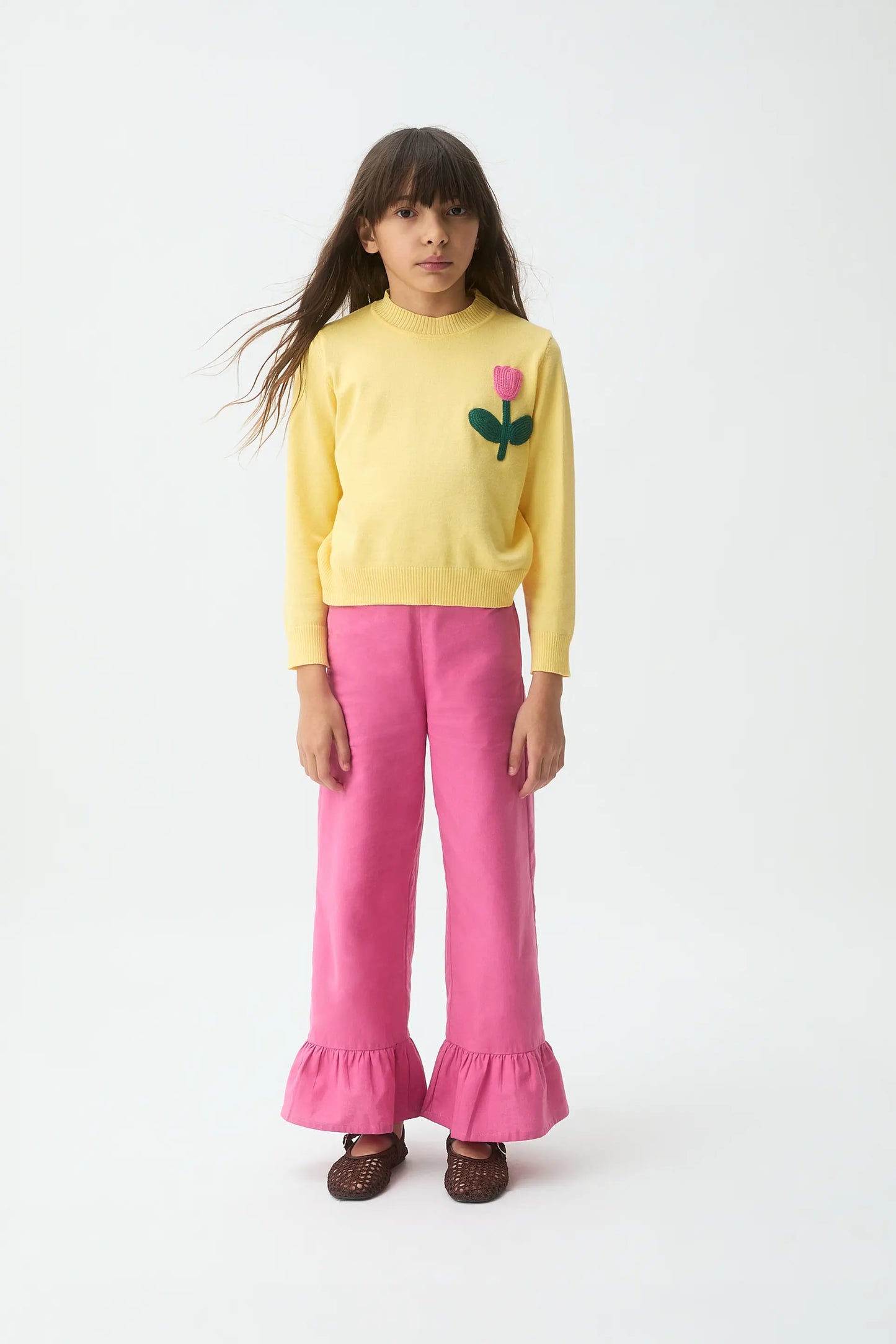 Girl's knitted sweater with flower embroidery