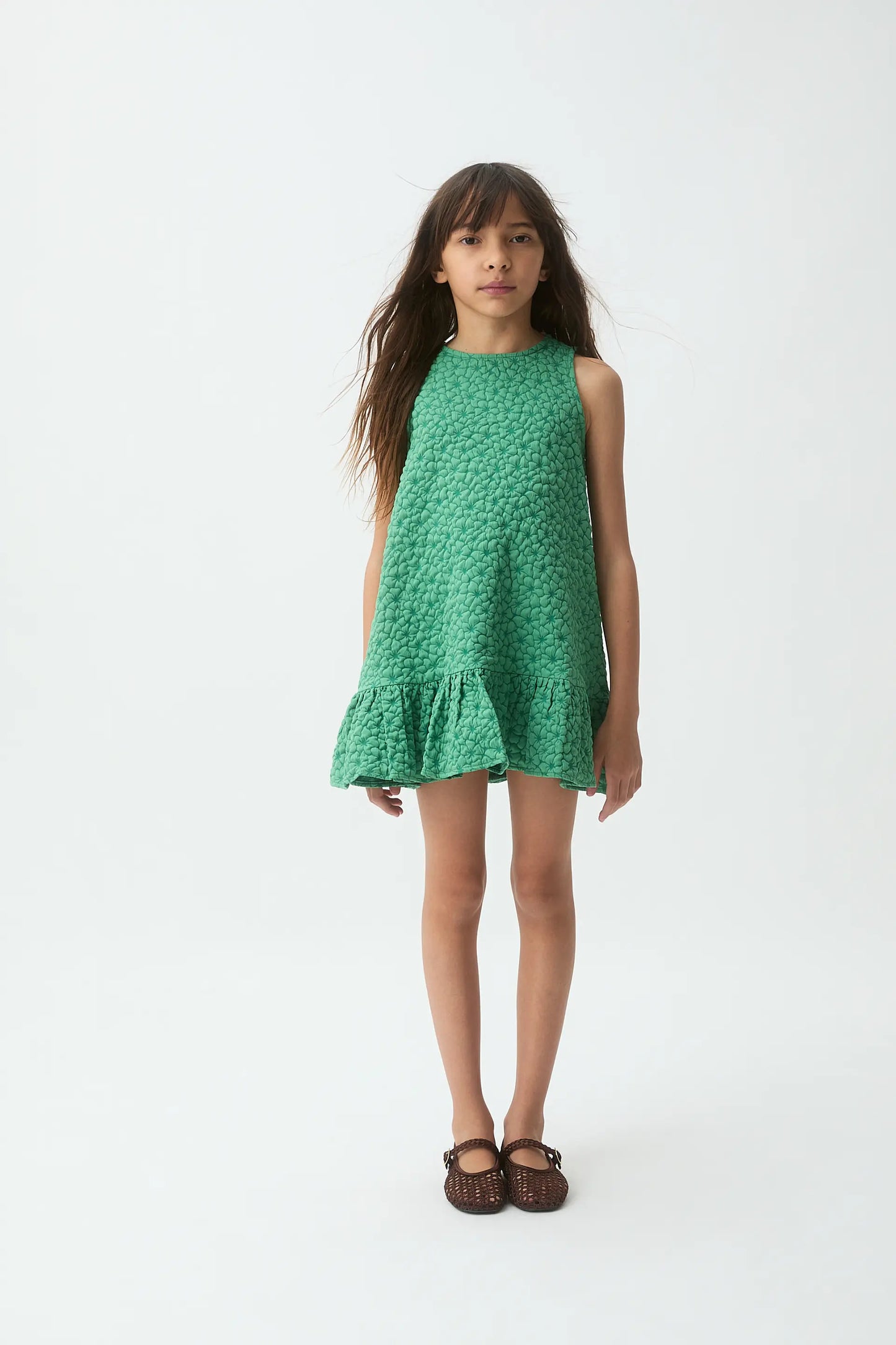 Short girl's dress with green floral print