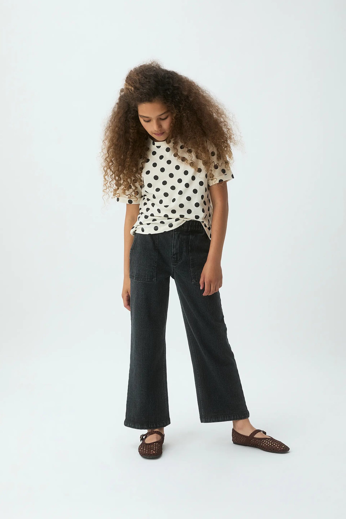Girl's T-shirt with black polka dot print