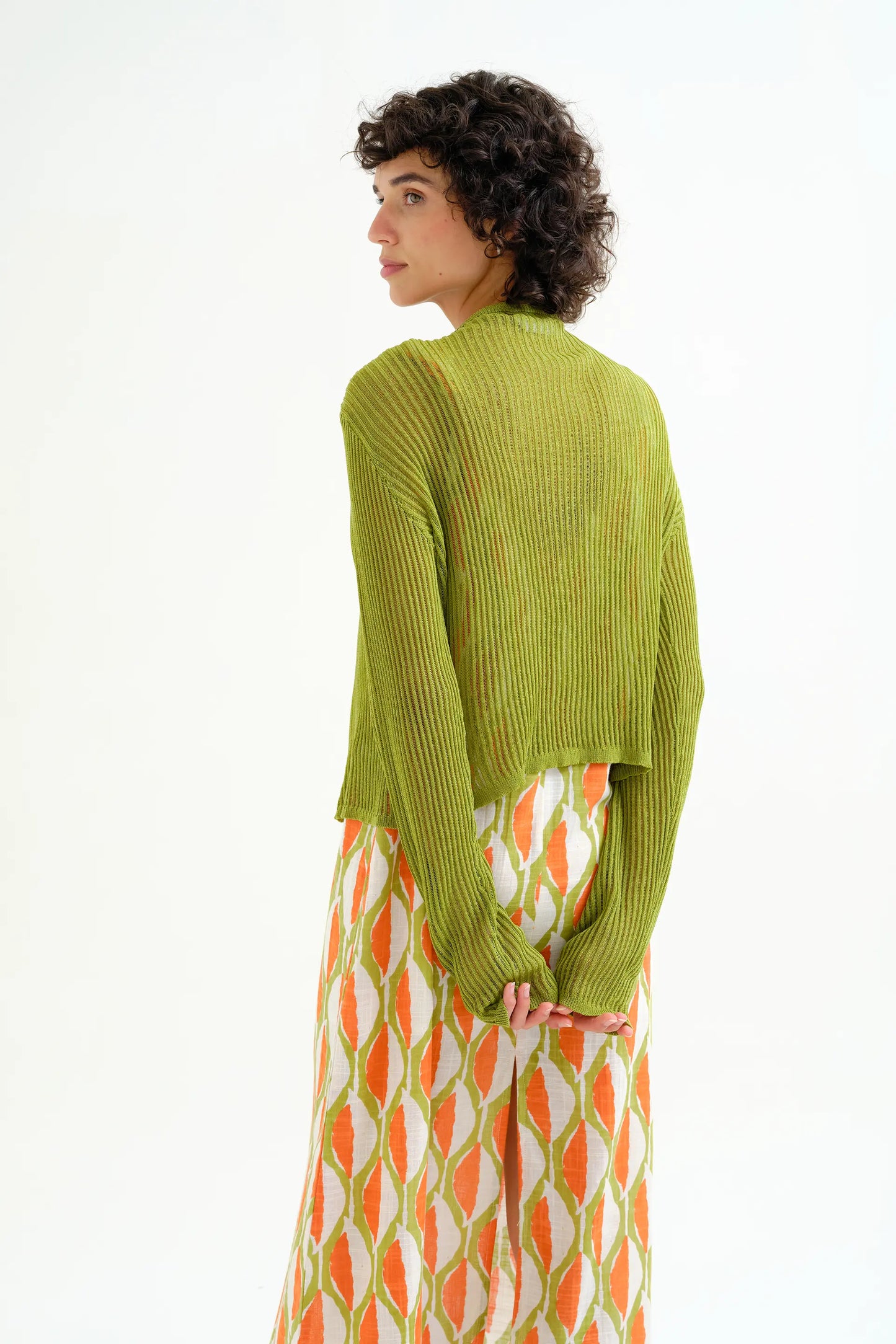 Long-sleeved green knit cardigan