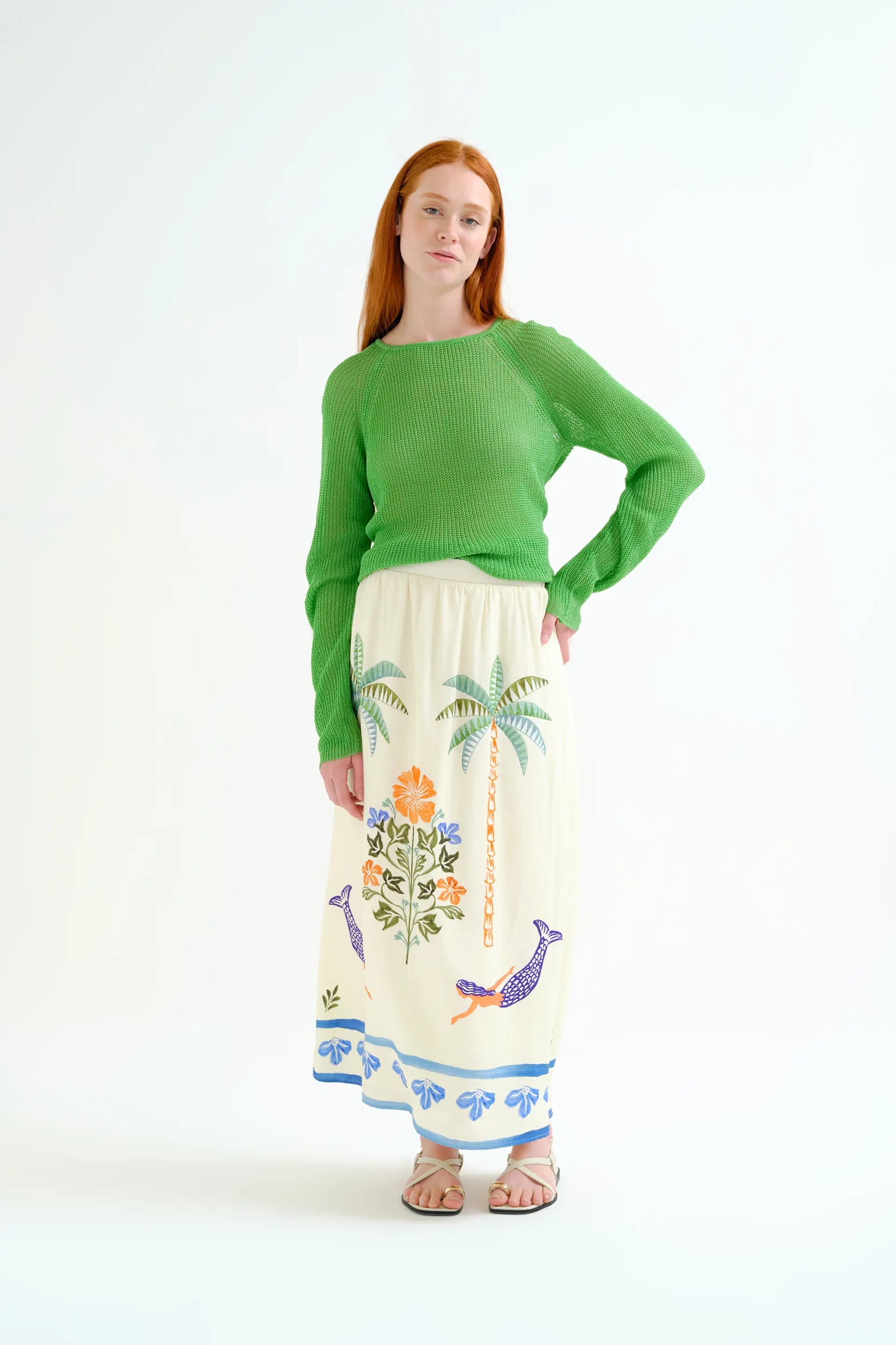 Maglione verde lavorato a maglia traforata