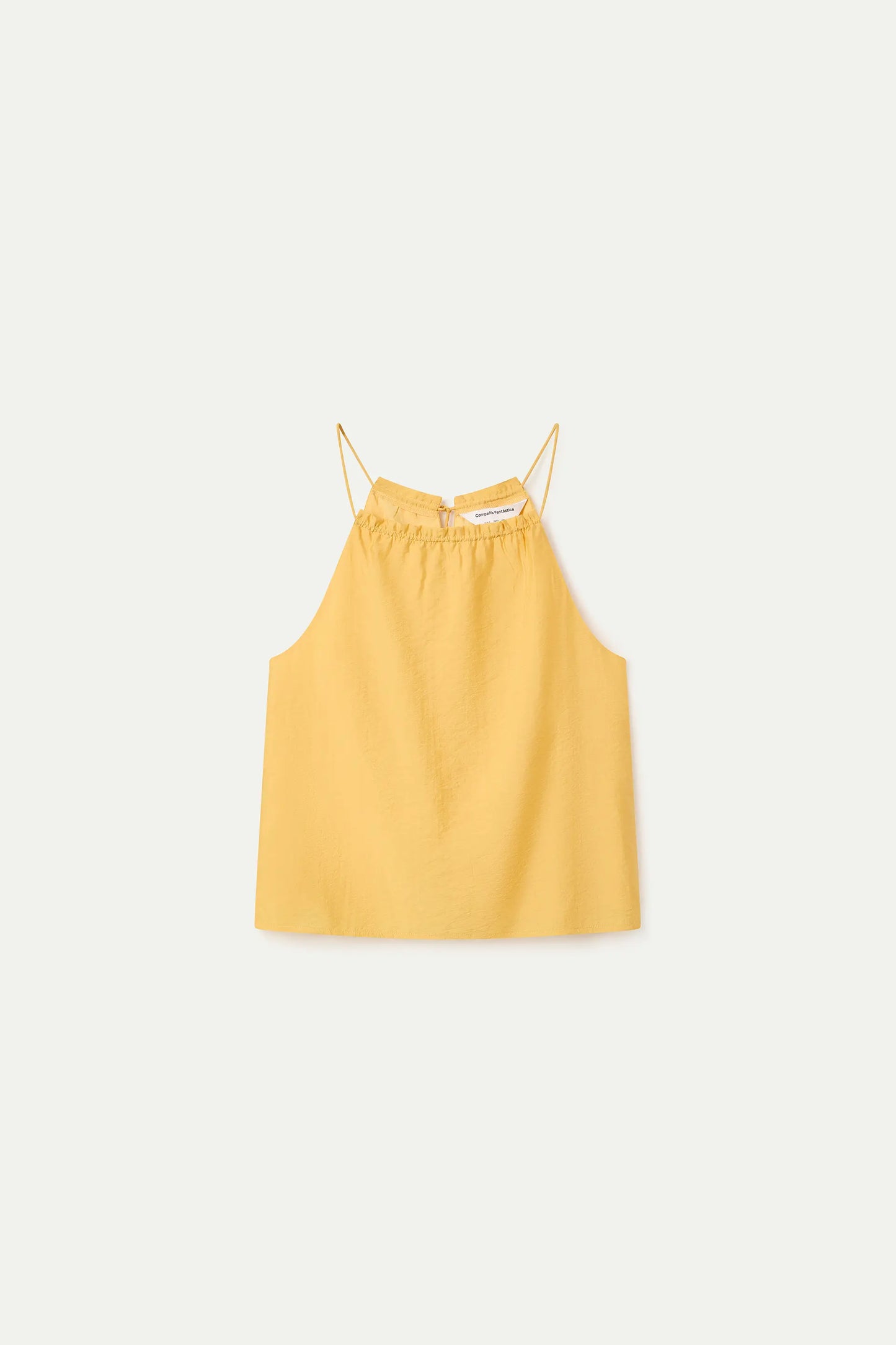 Top giallo con scollo all'americana