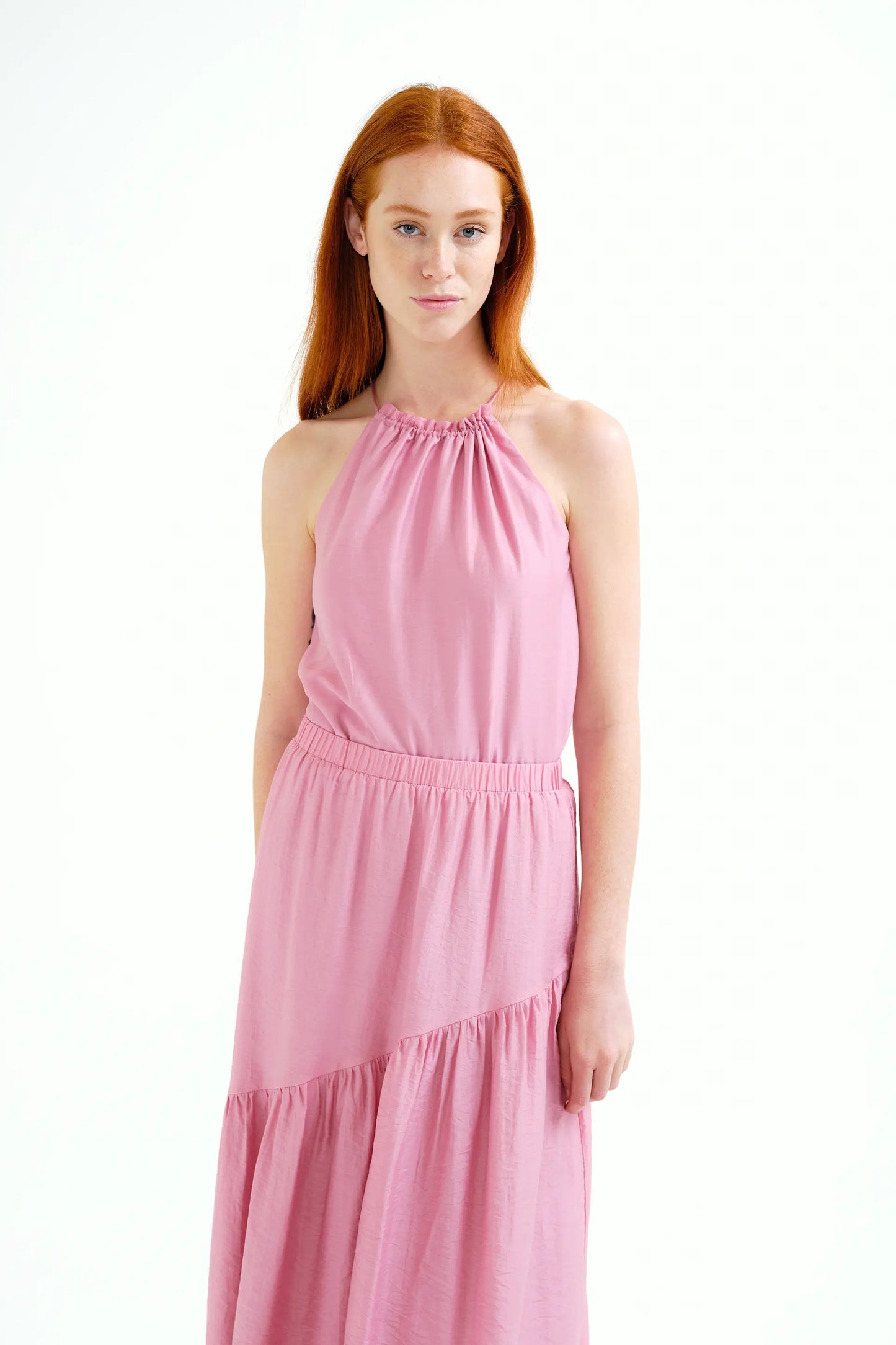Top rosa con scollo all'americana