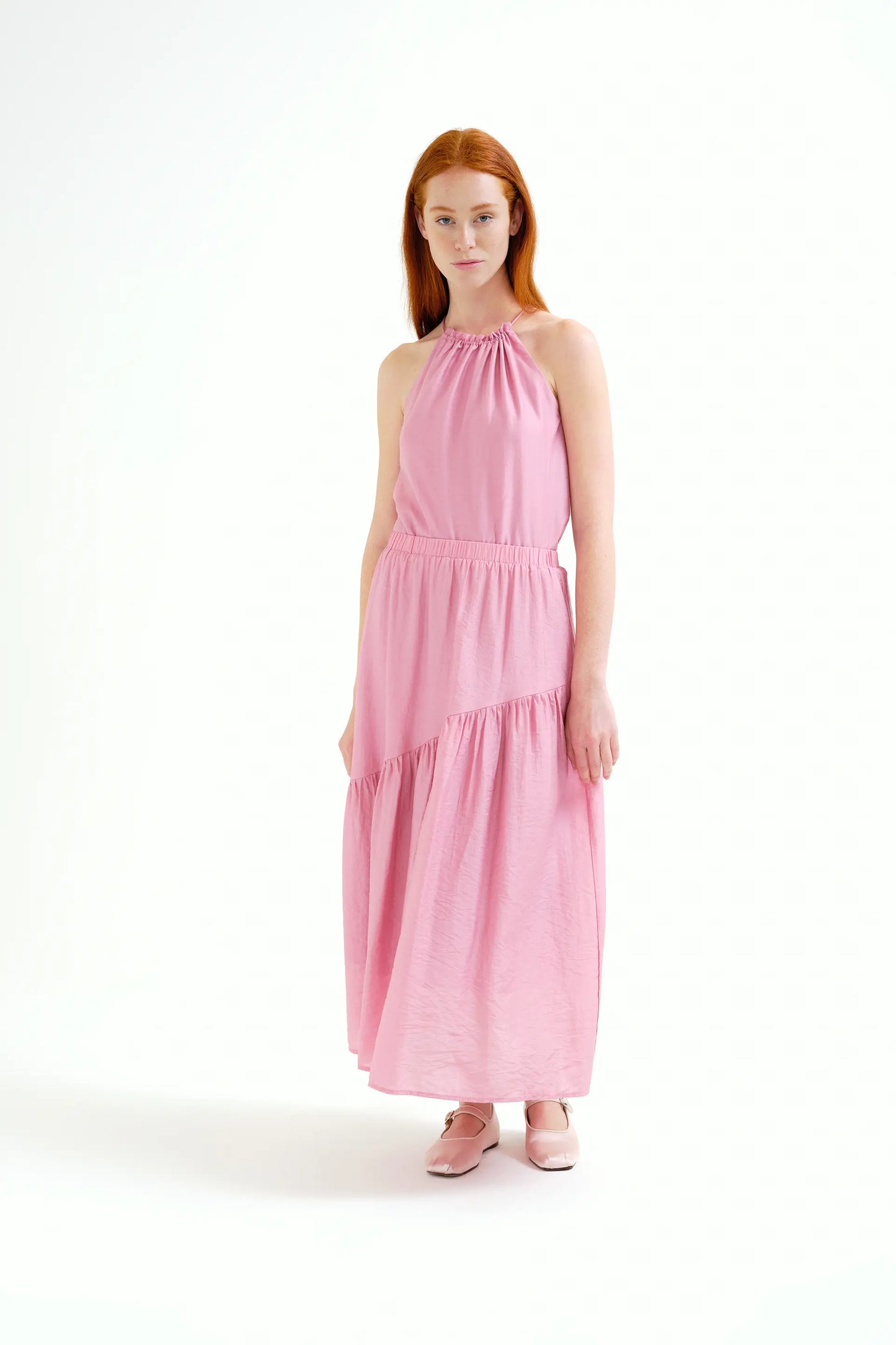 Top rosa con scollo all'americana