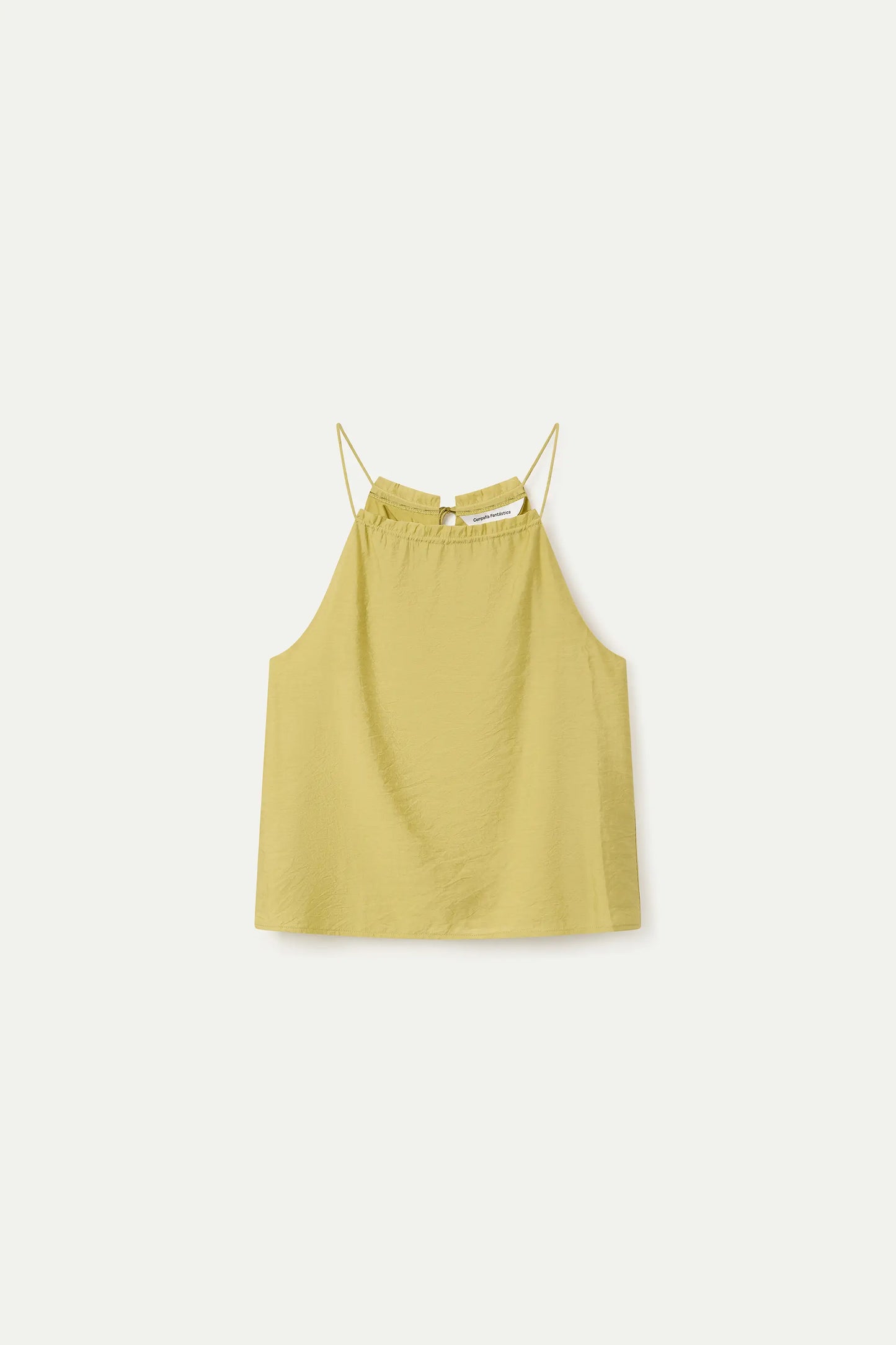 Top verde con scollo all'americana