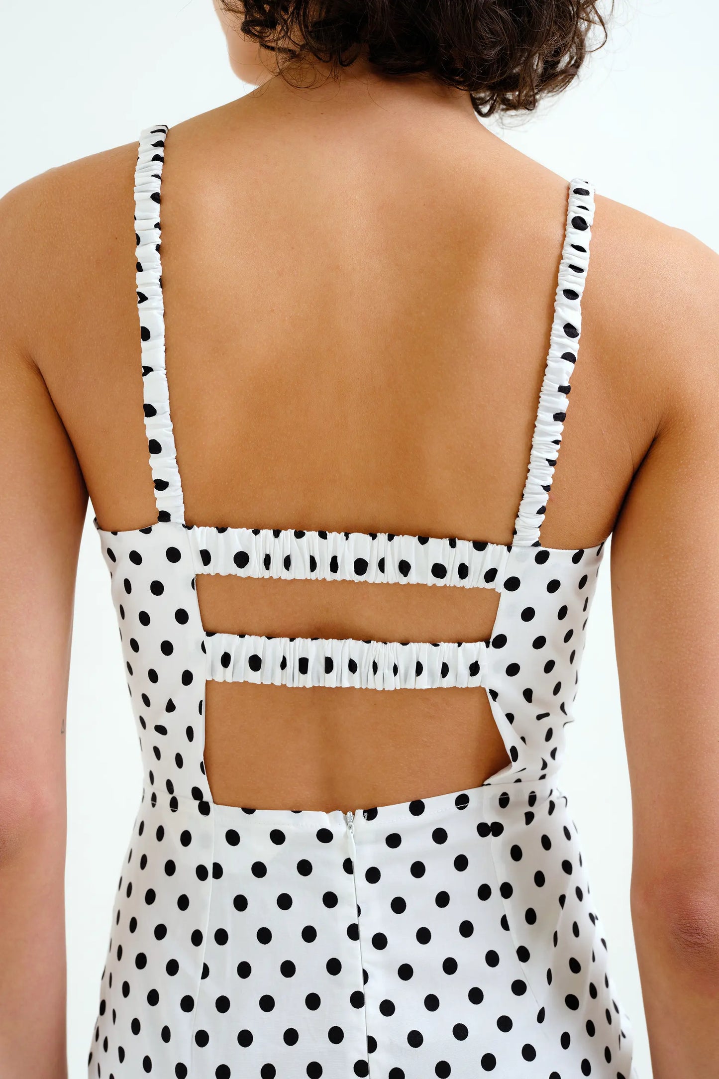 Black polka dot midi dress