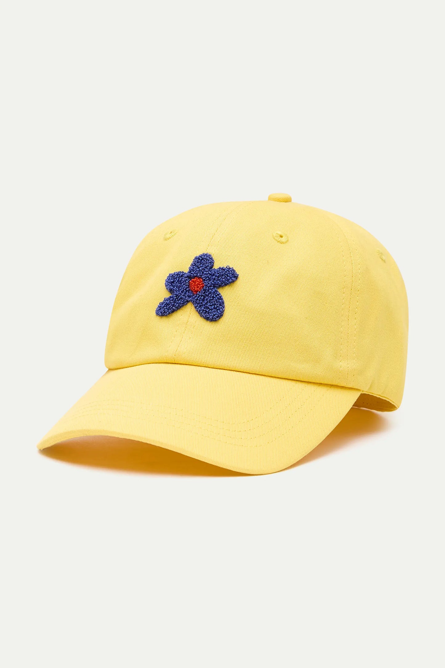 Yellow cap with blue flower embroidery