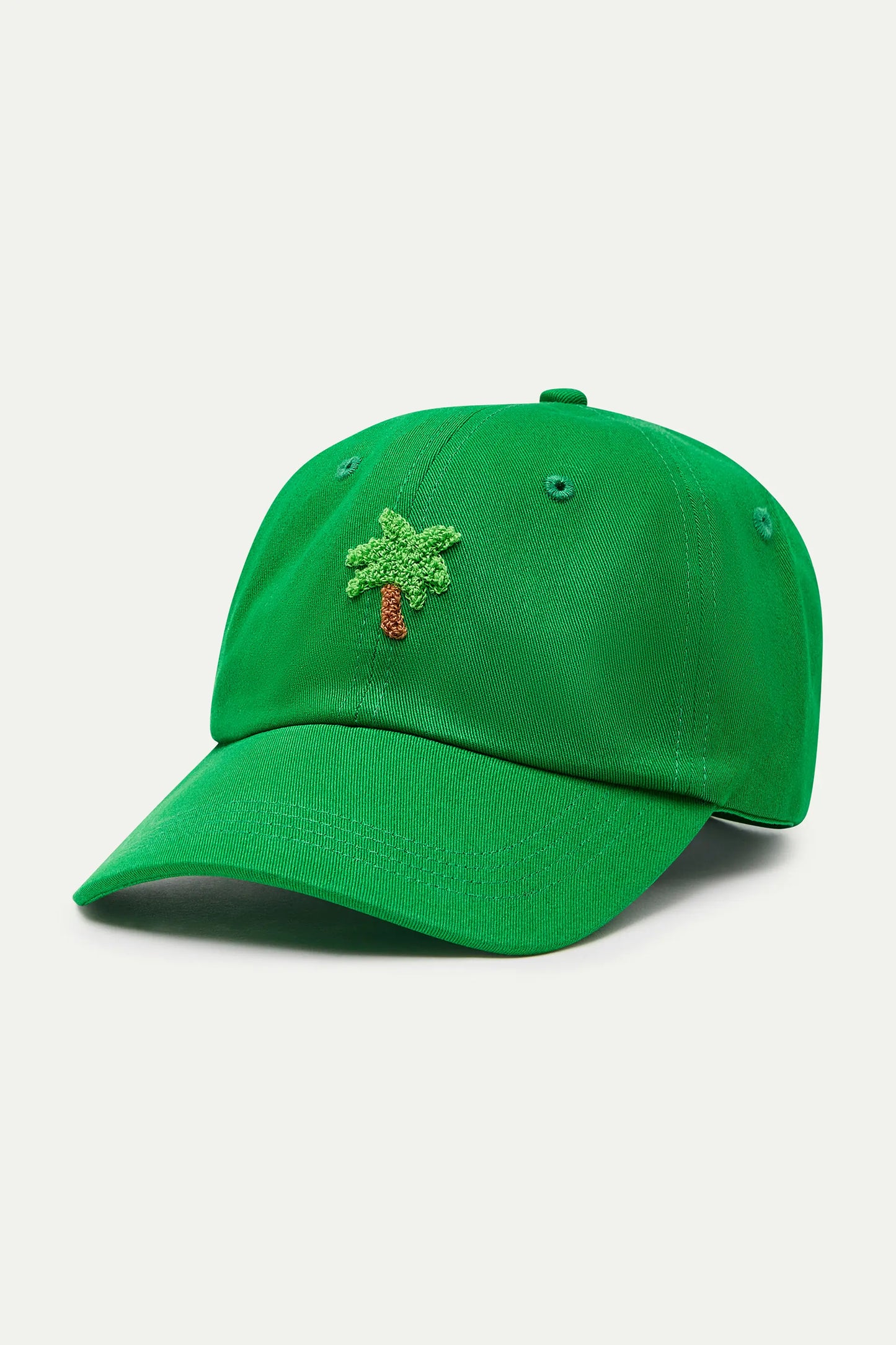 Berretto verde con ricamo di palme