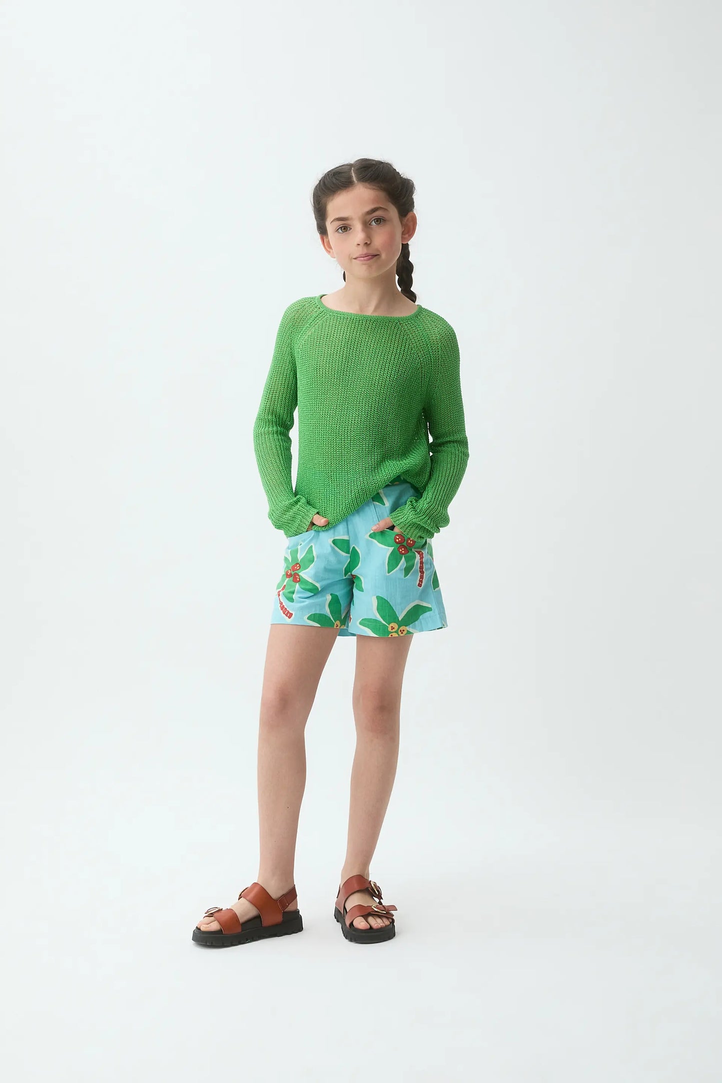 Girl's long-sleeved green knit sweater
