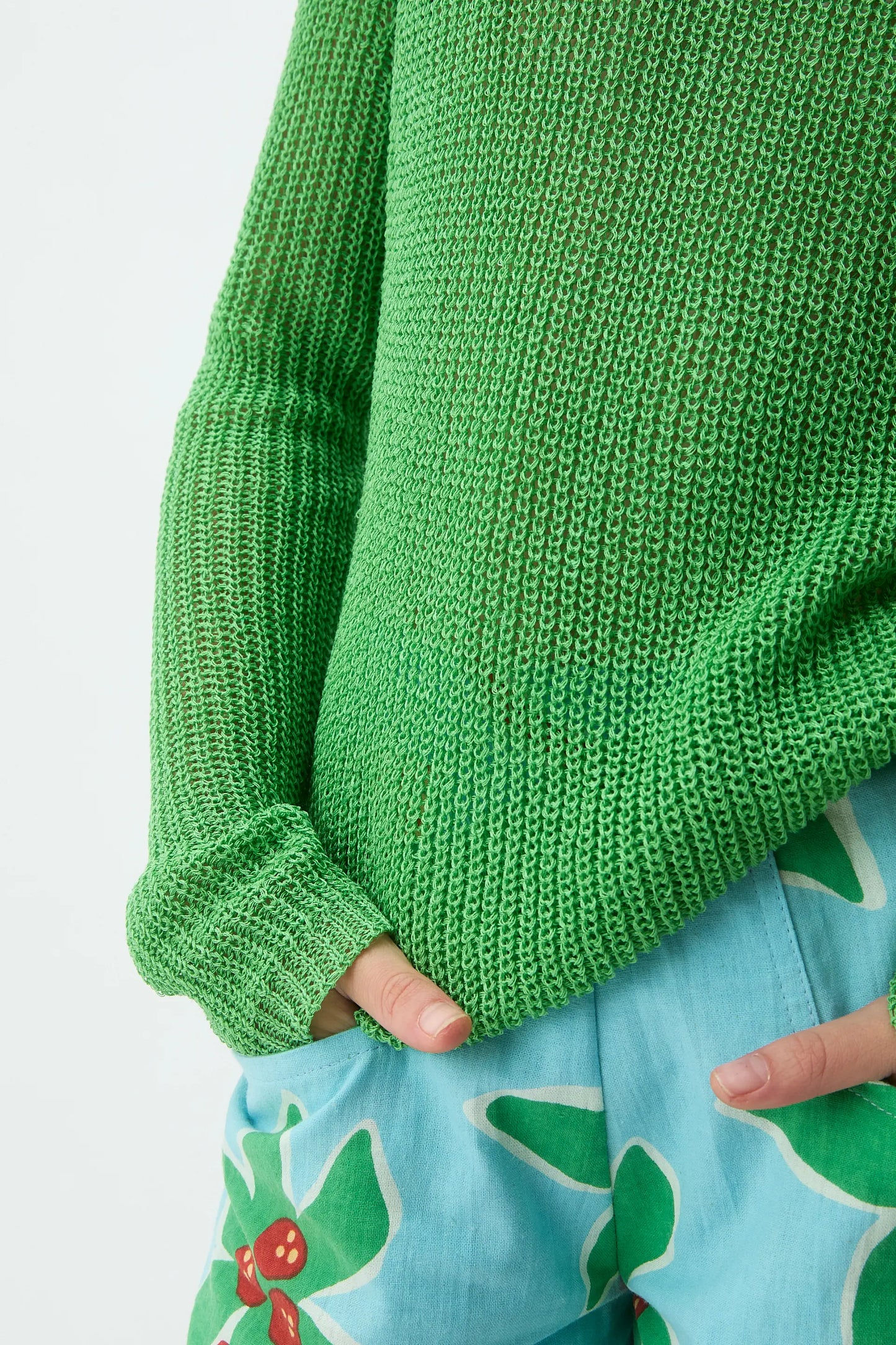 Girl's long-sleeved green knit sweater