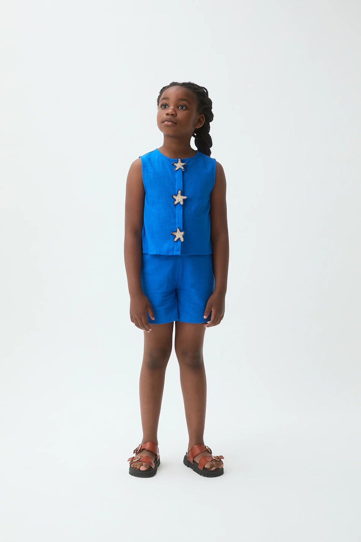 Top de niña 100% algodón azul con parche de estrellas