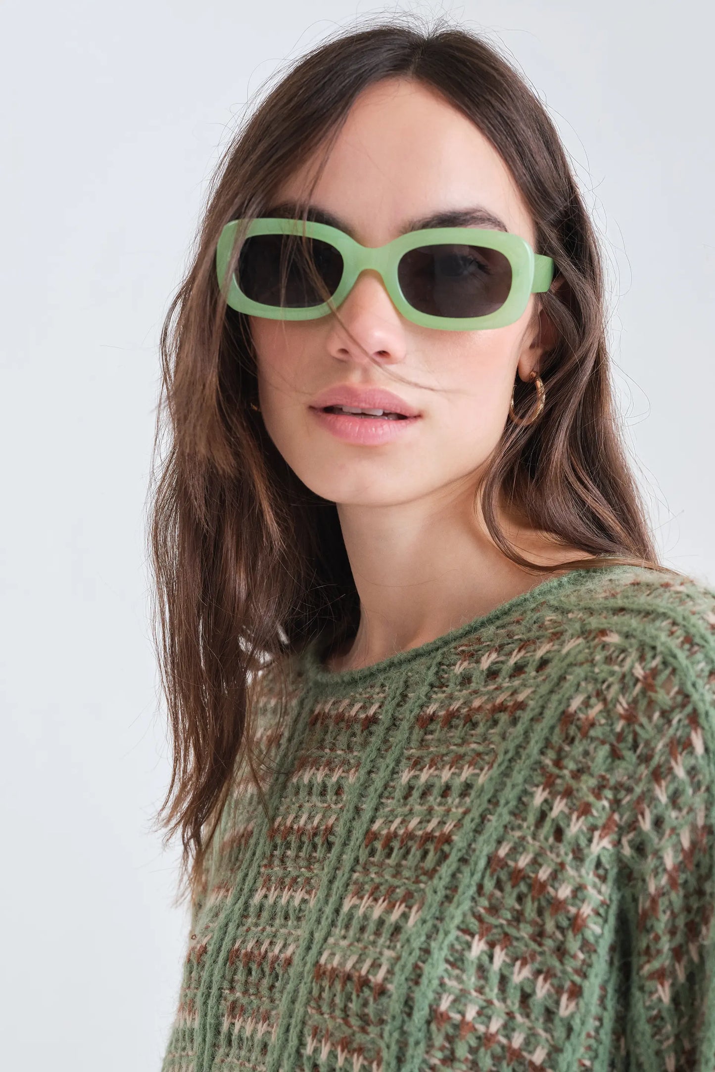 Green knitted jumper with embroidered details