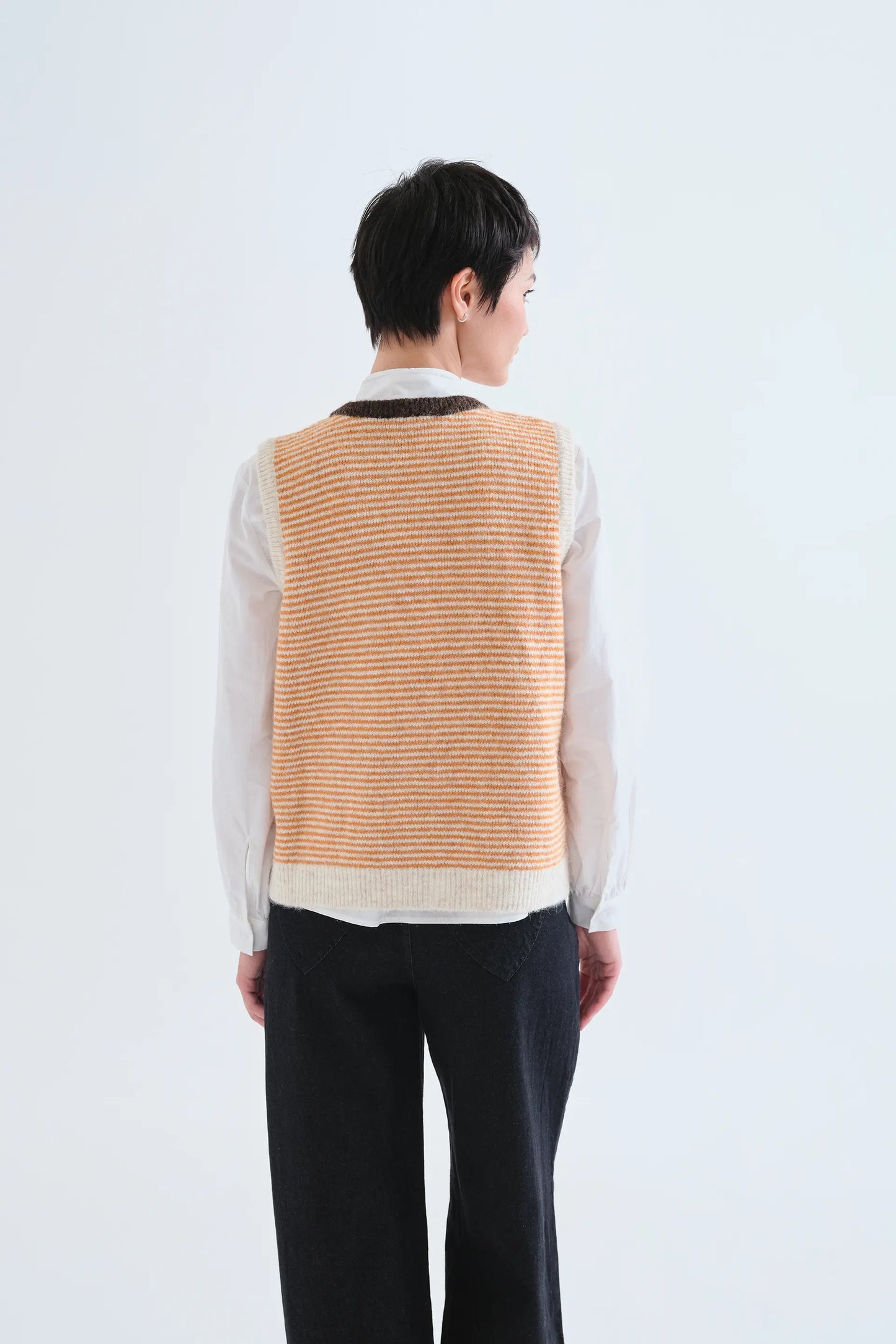 Chaleco de punto con estampado de rayas naranja y blanco