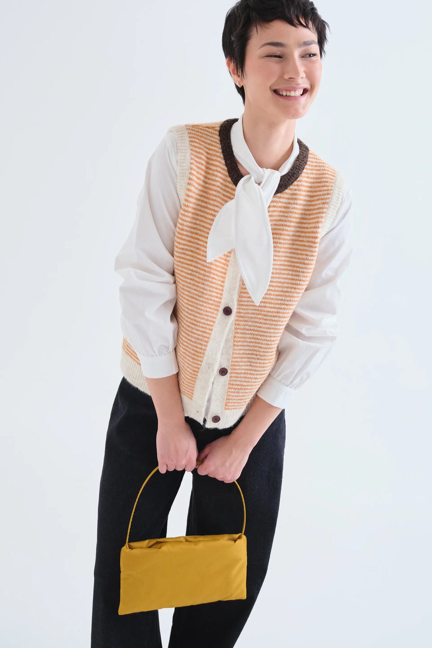 Chaleco de punto con estampado de rayas naranja y blanco
